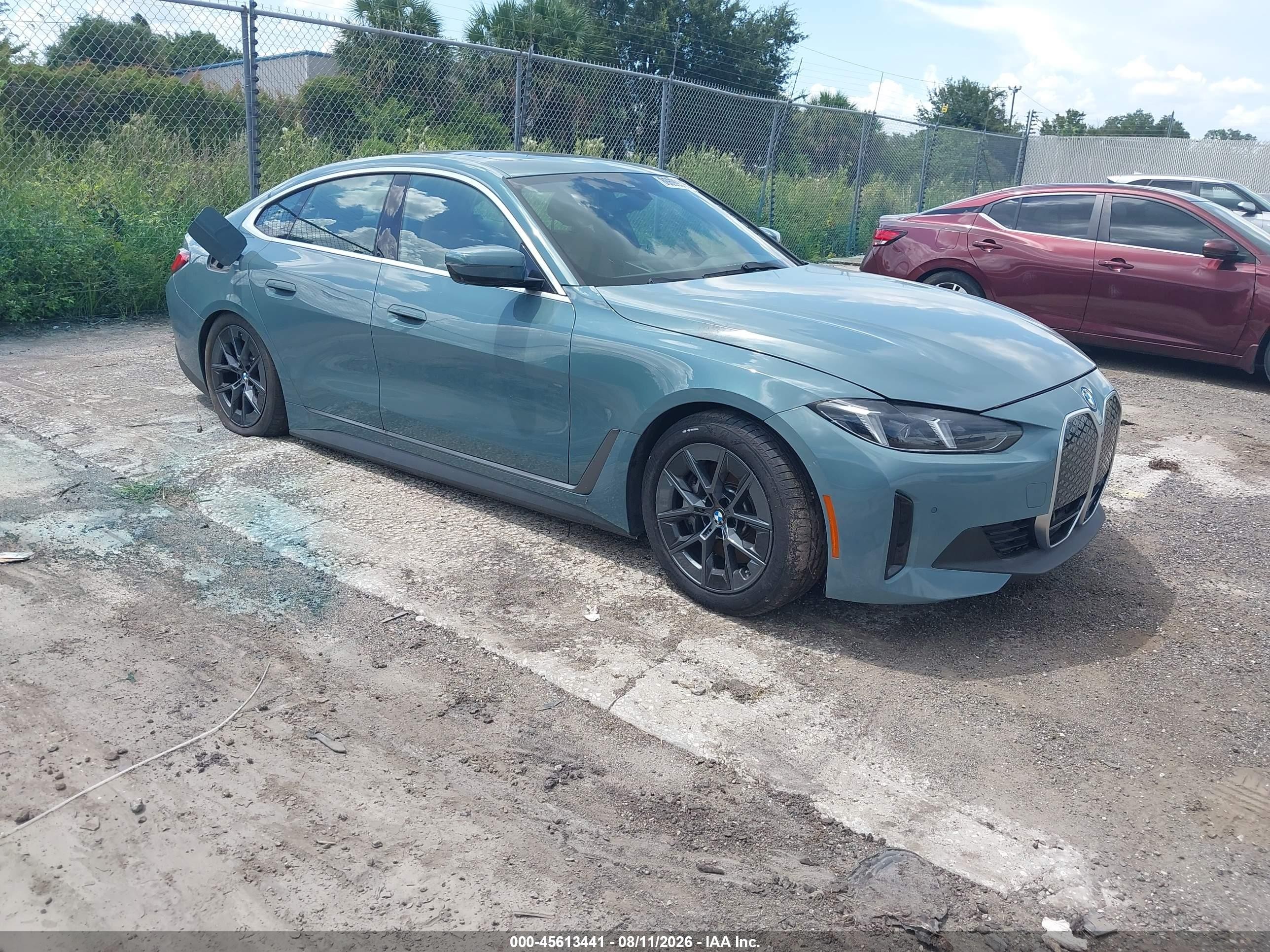 2025 BMW i4 eDrive40, VIN WBY23HD01SFU78144 — Зад