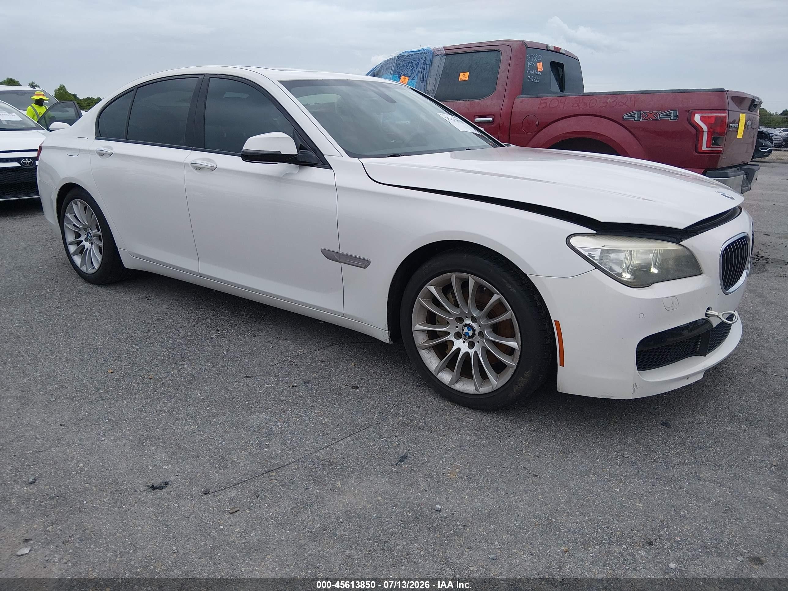2014 BMW 7 Series 740i, VIN WBAYA6C53ED144505 — Water / flood