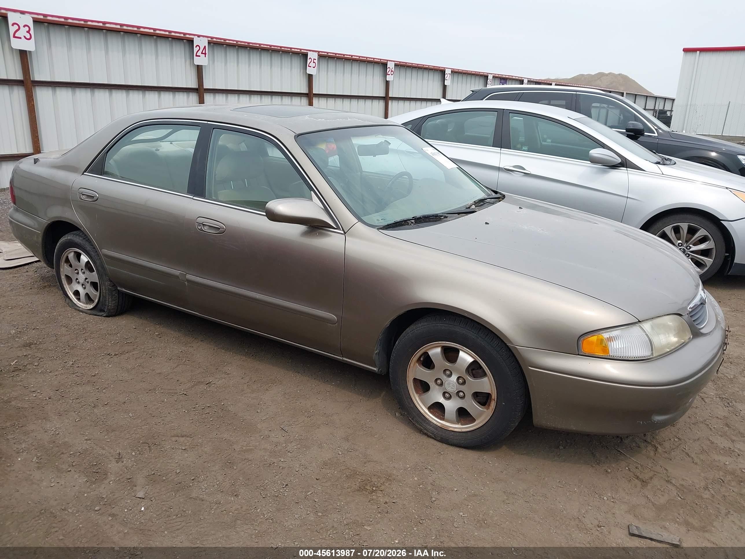 1998 Mazda 626 LX, VIN 1YVGF22D3W5759904 — Front end