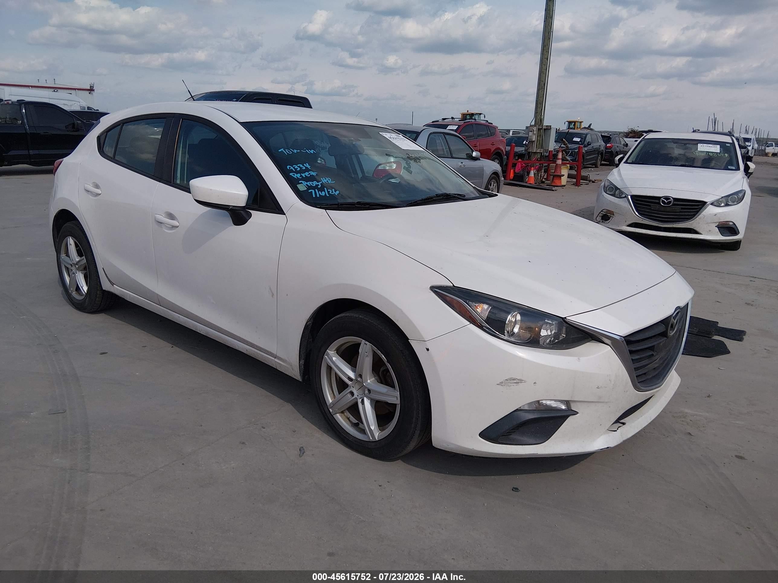 2014 Mazda 3 i Sport, VIN JM1BM1K71E1203168 — Зад