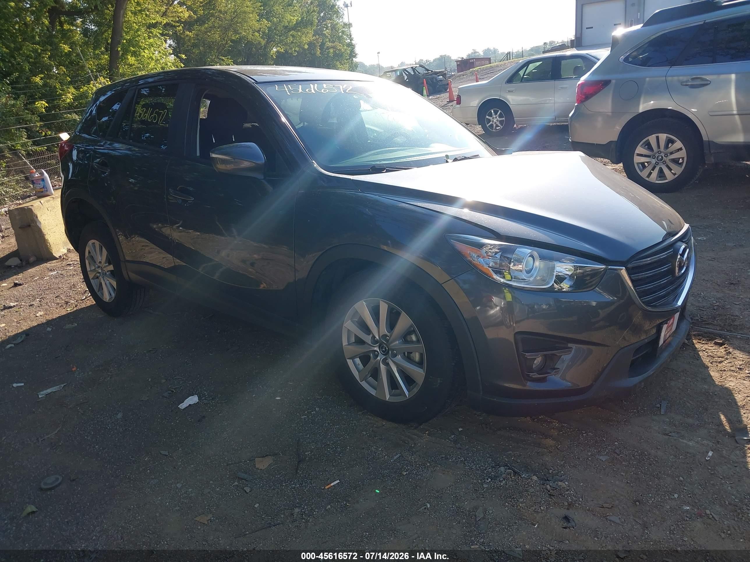 2016 Mazda CX-5 Touring, VIN JM3KE2CY5G0921218 — Front end