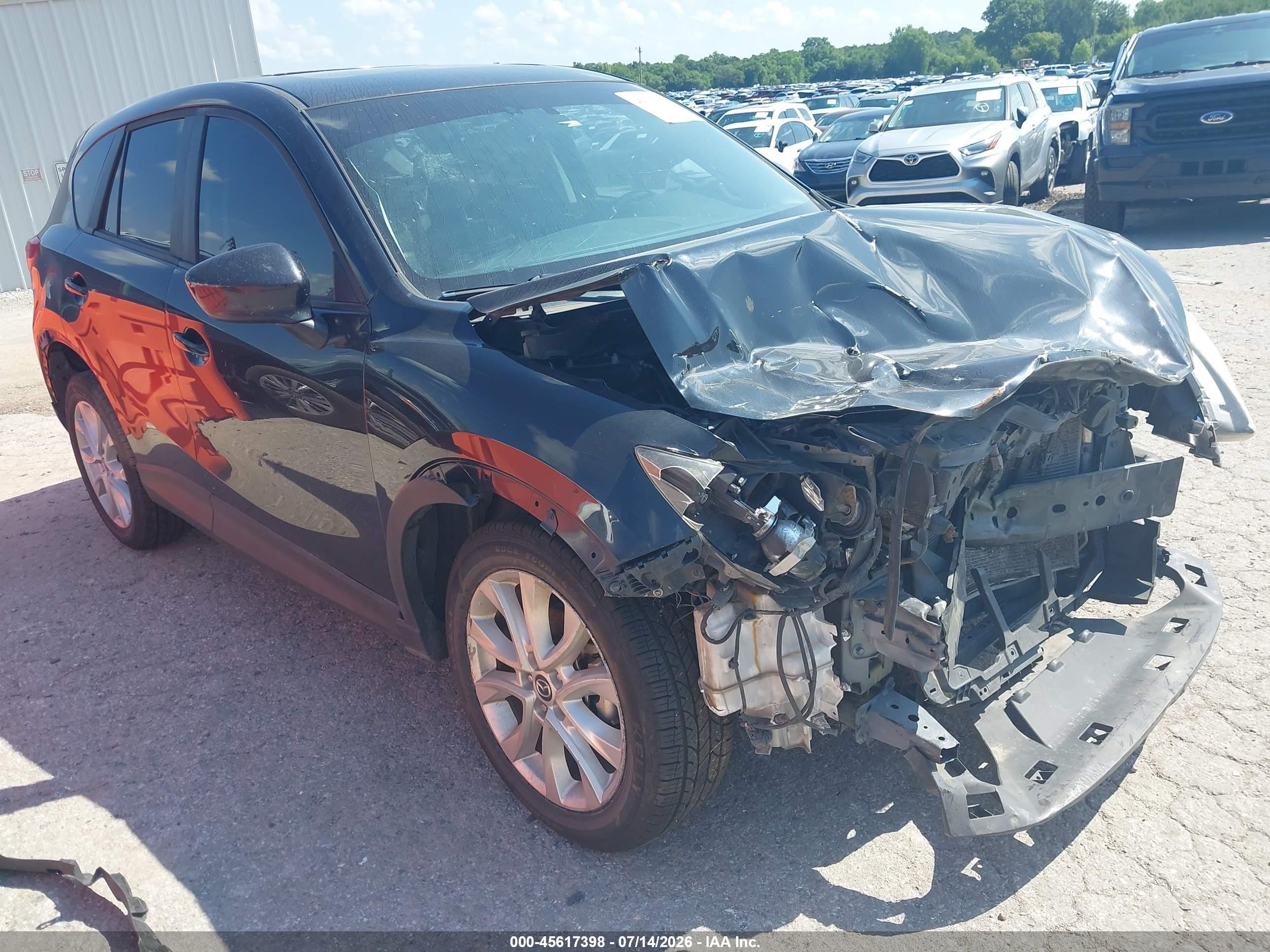 2014 Mazda CX-5 Grand Touring, VIN JM3KE2DYXE0317241 — Normal wear