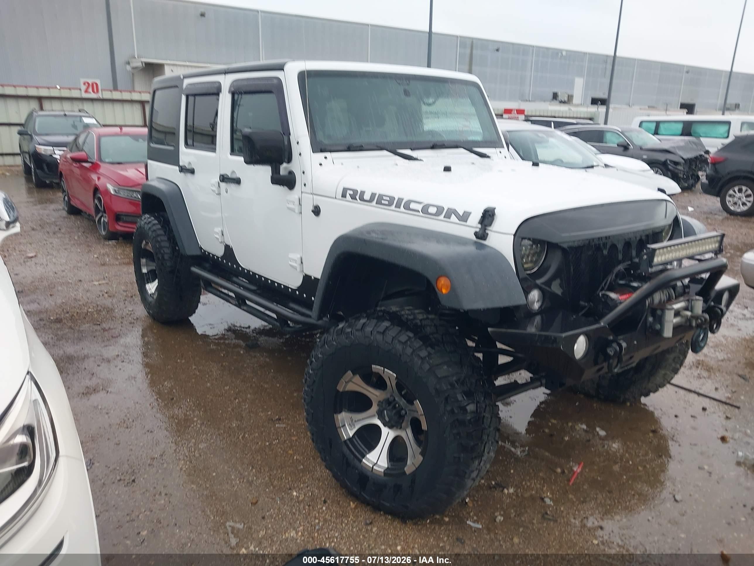 2011 Jeep Wrangler Unlimited Rubicon, VIN 1J4BA6H10BL536027 — Зад