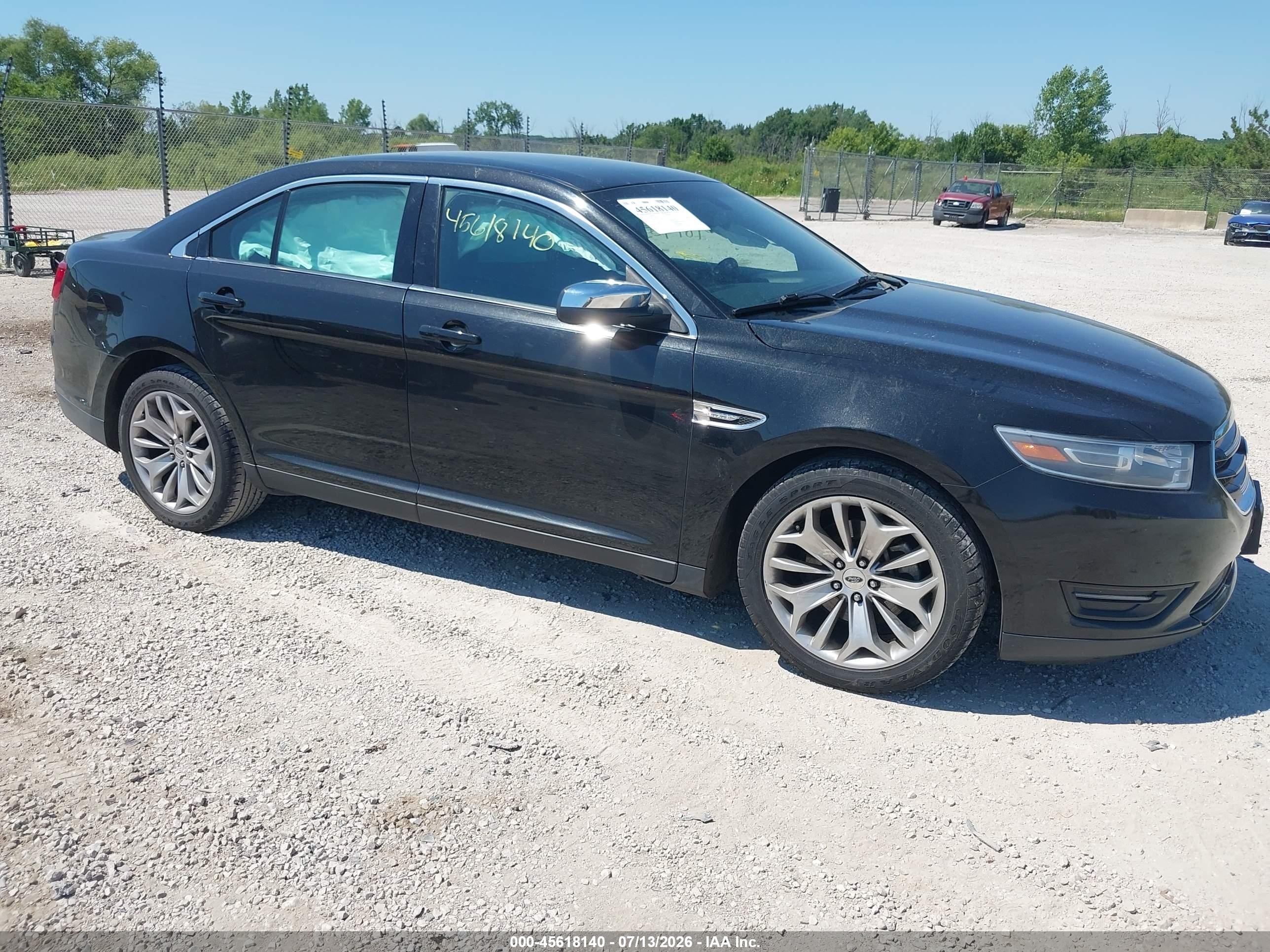 2015 Ford Taurus Limited, VIN 1FAHP2F8XFG170685 — Side