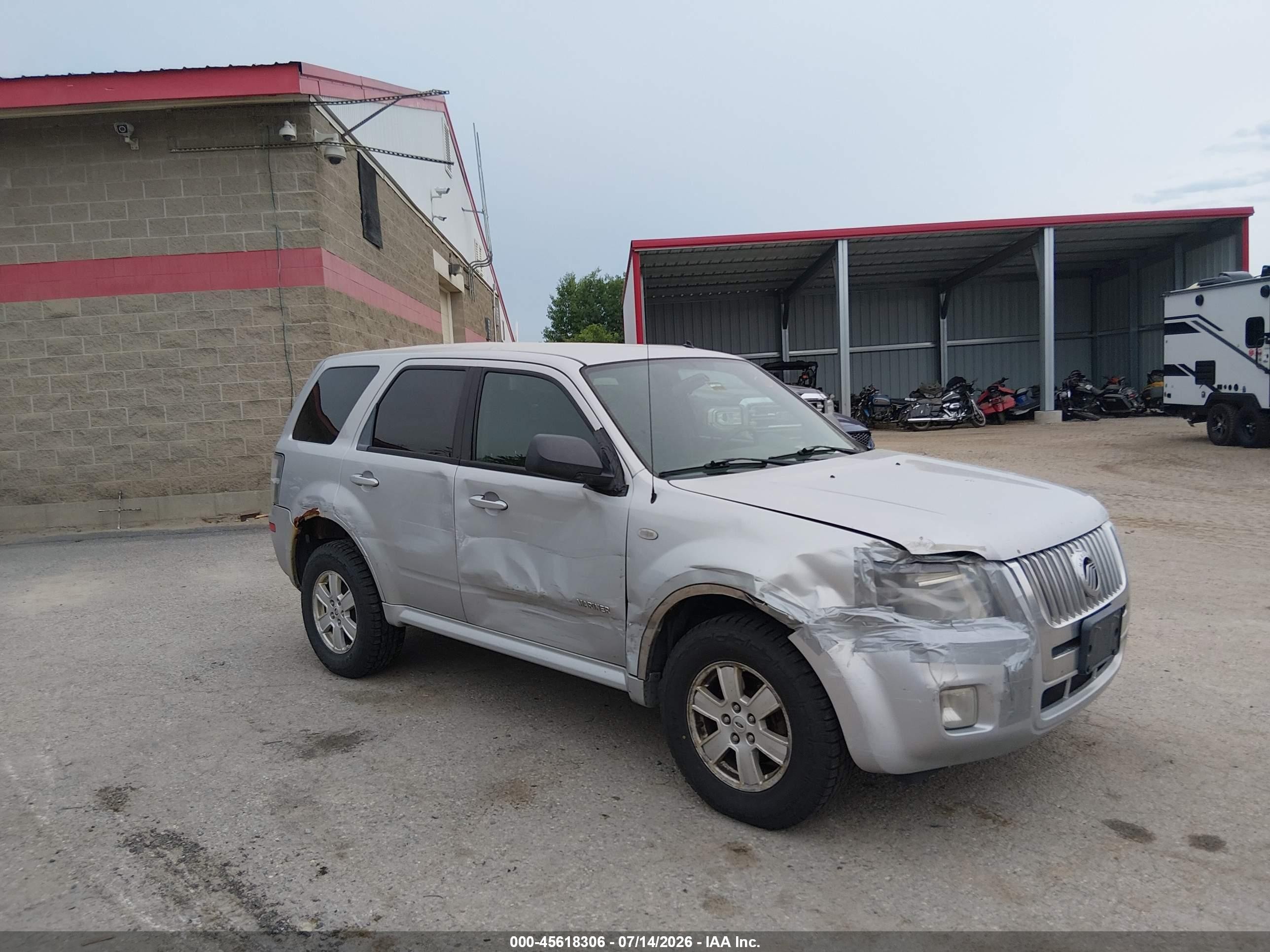 2008 Mercury Mariner, VIN 4M2CU91158KJ36941 — Side