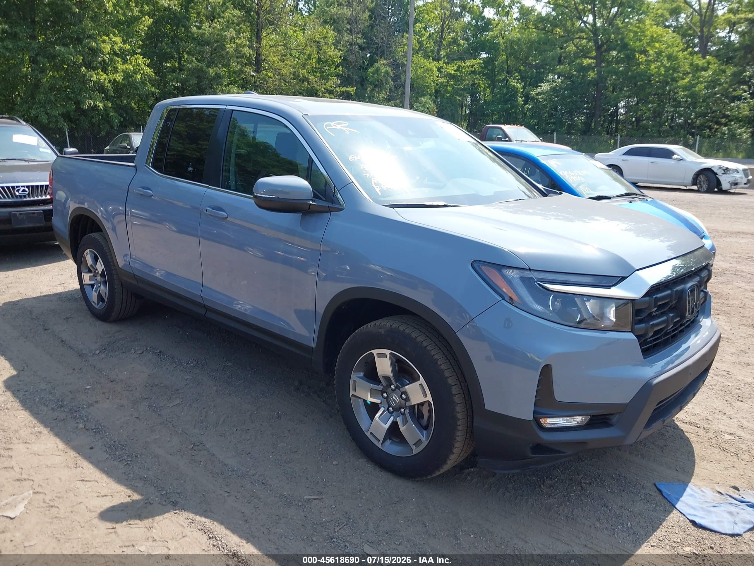 2026 Honda Ridgeline RTL, VIN 5FPYK3F57TB027680 — Side