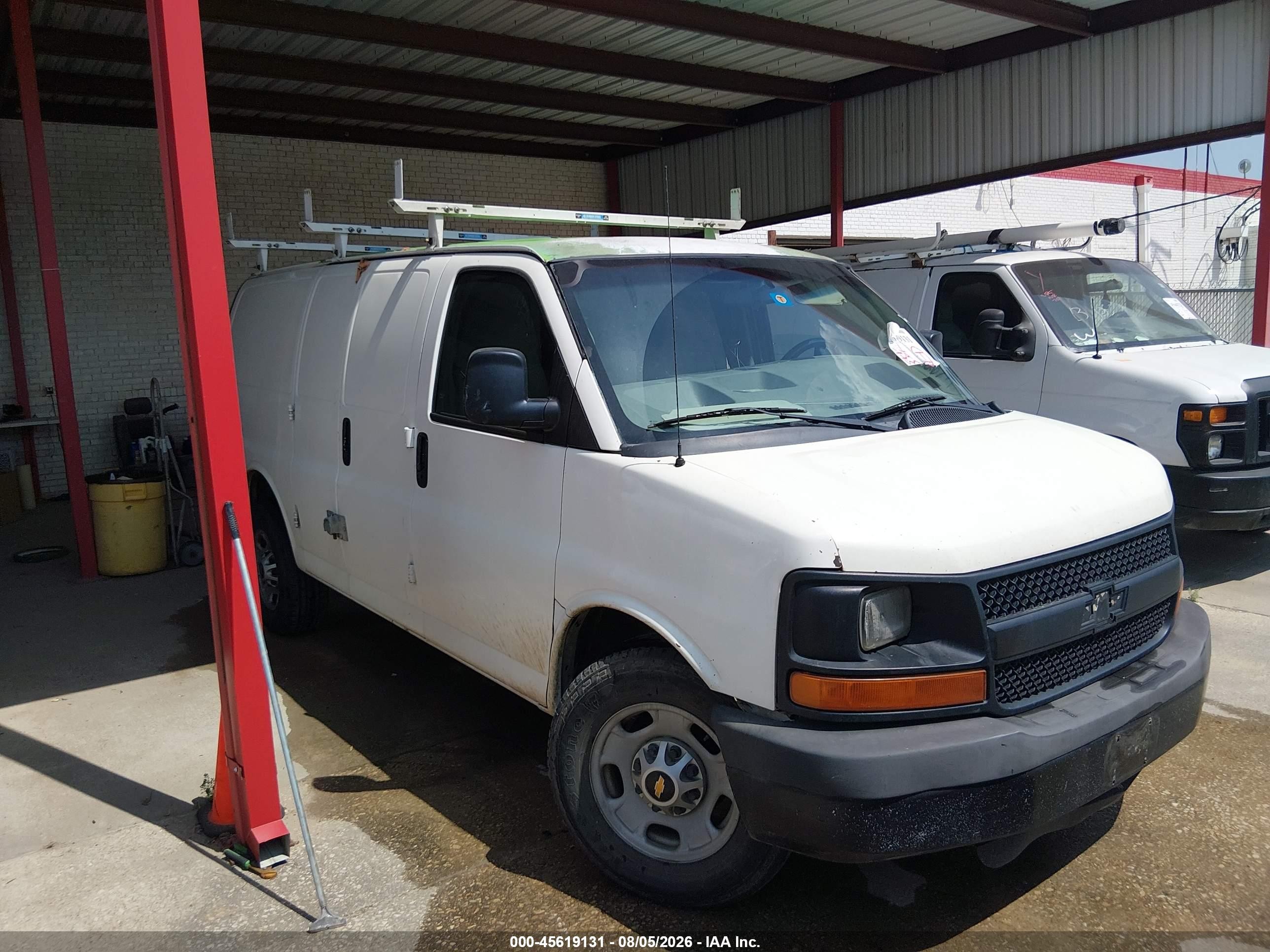 2011 Chevrolet Express Cargo, VIN 1GCWGFBA0B1105875 — Normal wear