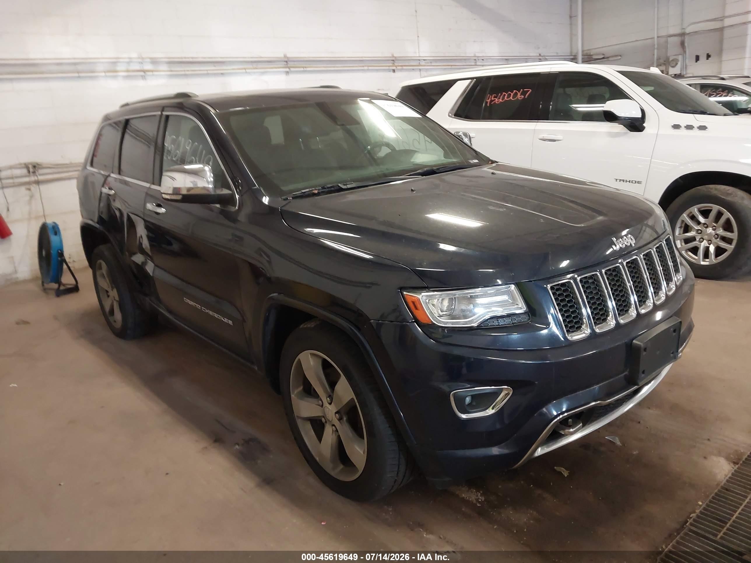 2014 Jeep Grand Cherokee Overland, VIN 1C4RJFCT7EC441692 — Normal wear
