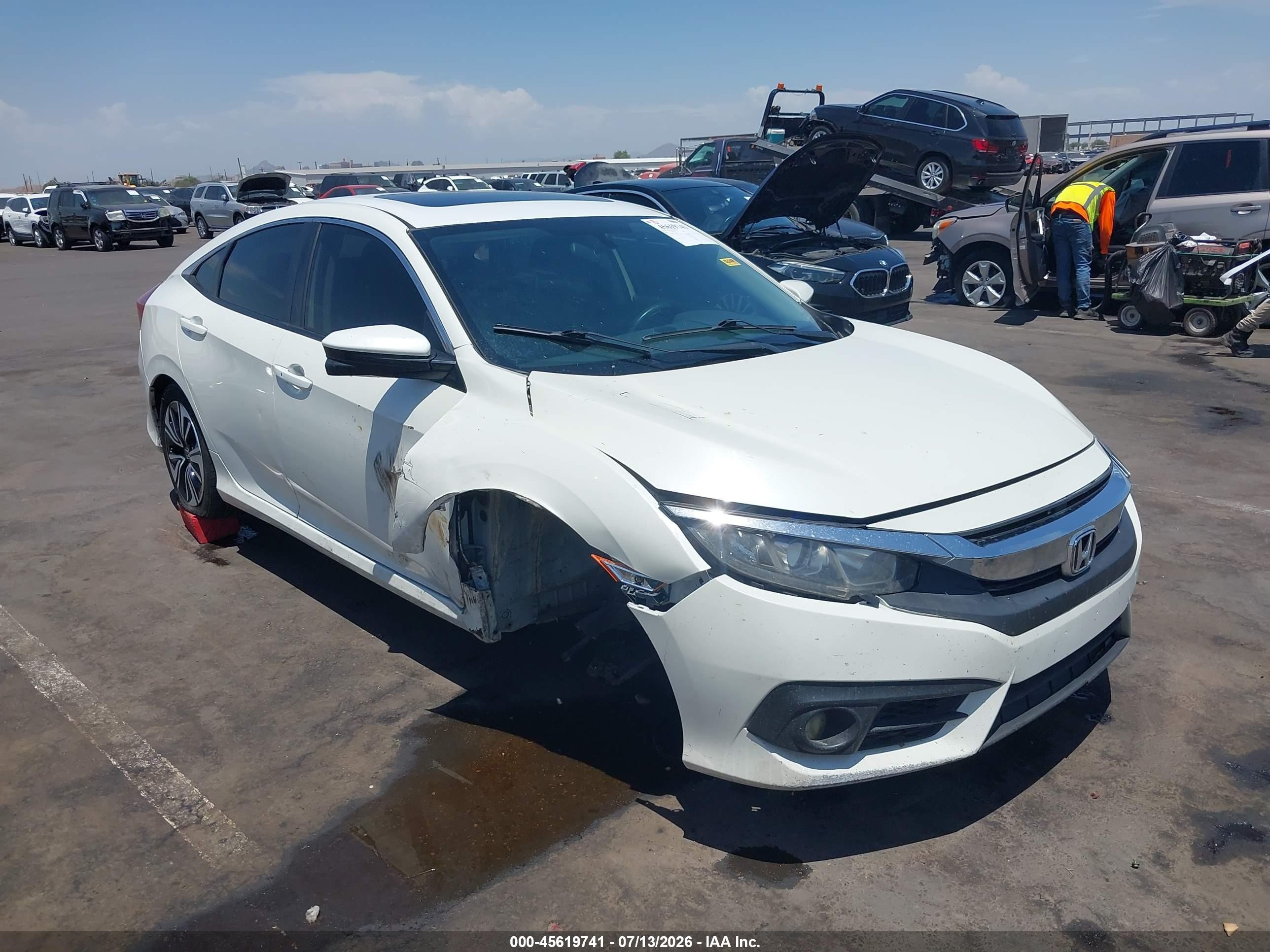 2018 Honda Civic EX-T, VIN JHMFC1F37JX038776 — Side