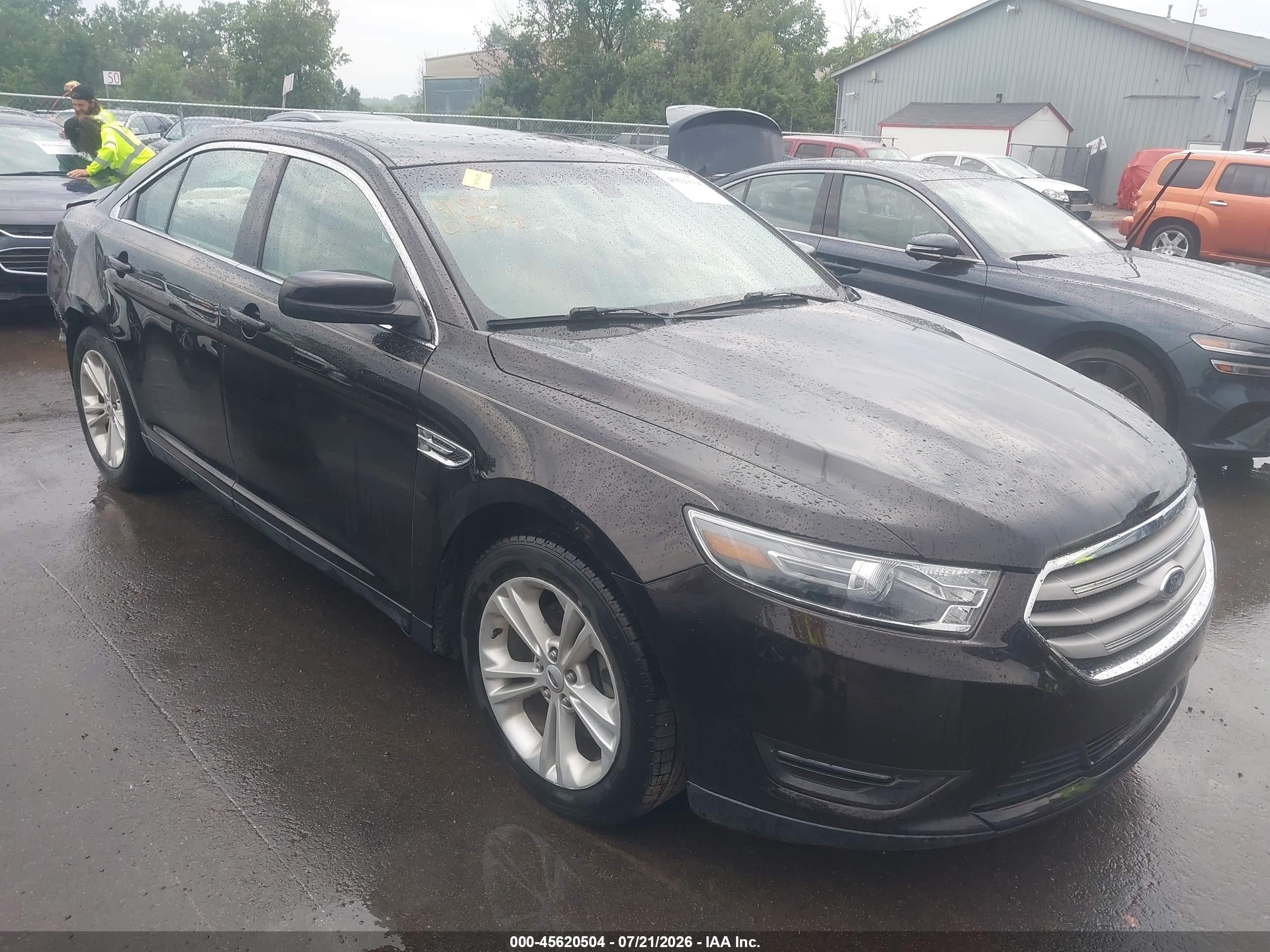 2014 Ford Taurus SEL, VIN 1FAHP2E89EG136897 — Зад