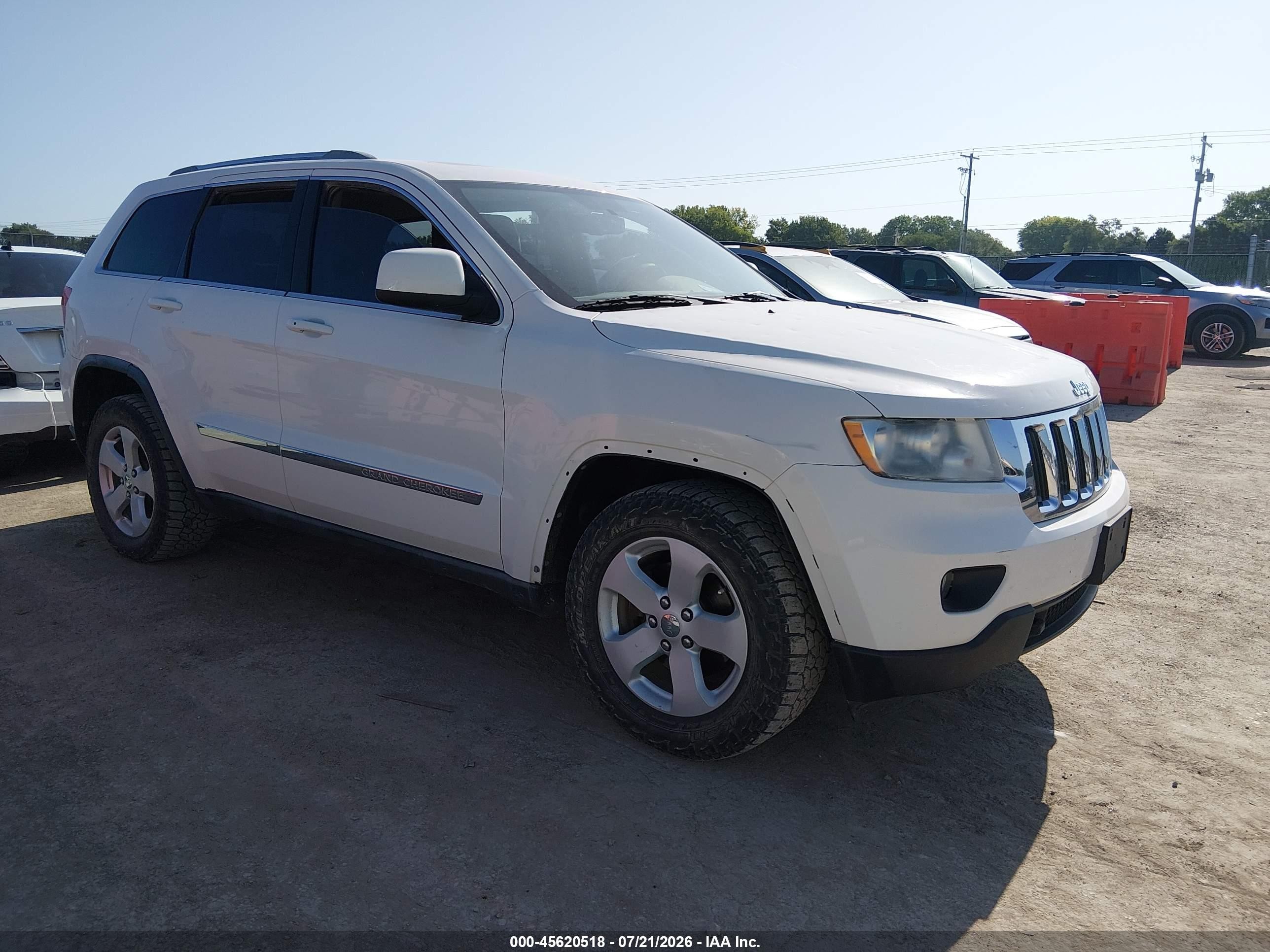 2011 Jeep Grand Cherokee Laredo, VIN 1J4RR4GG4BC738550 — Hail