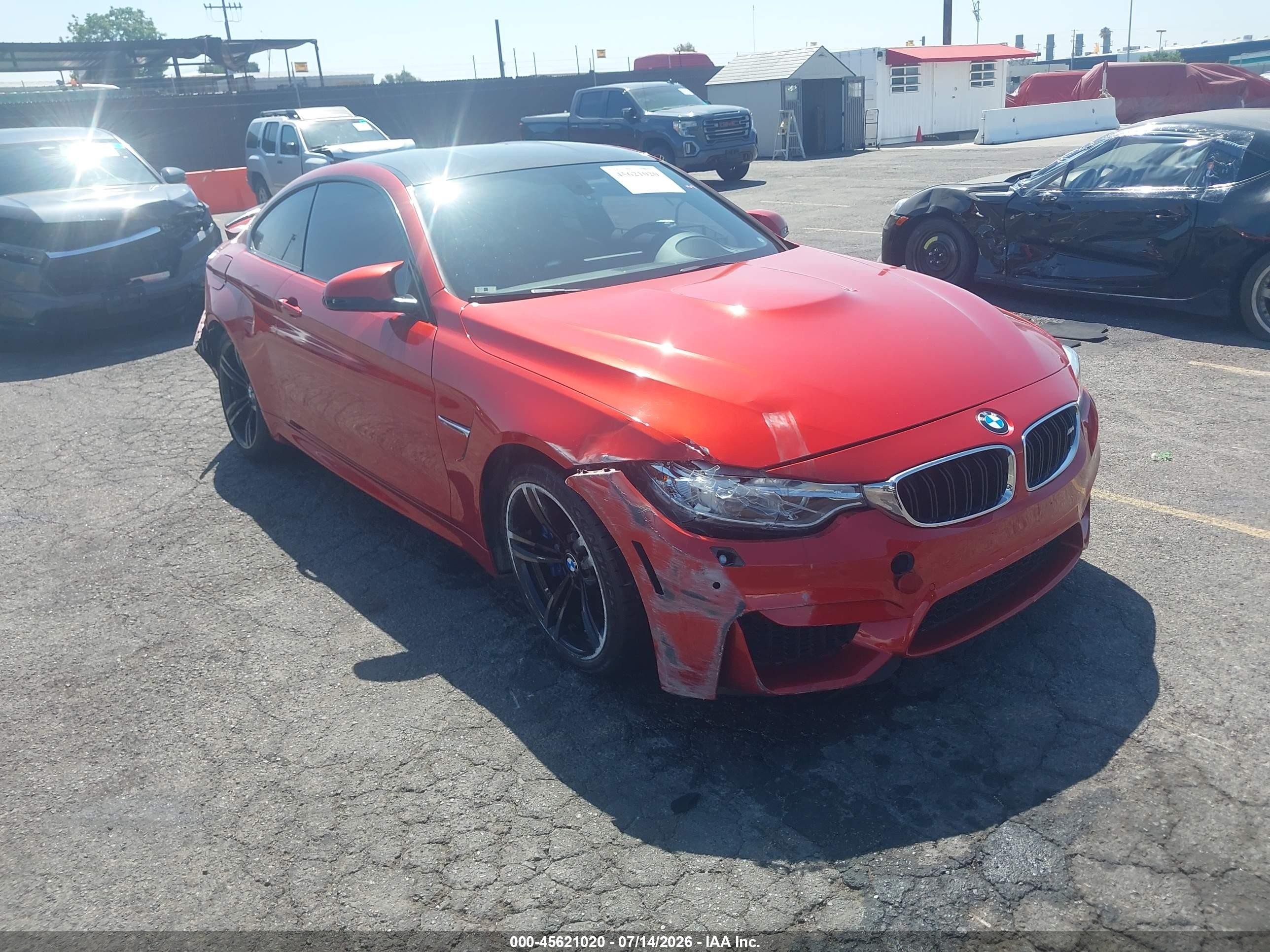 2015 BMW M4, VIN WBS3R9C58FK330960 — Side