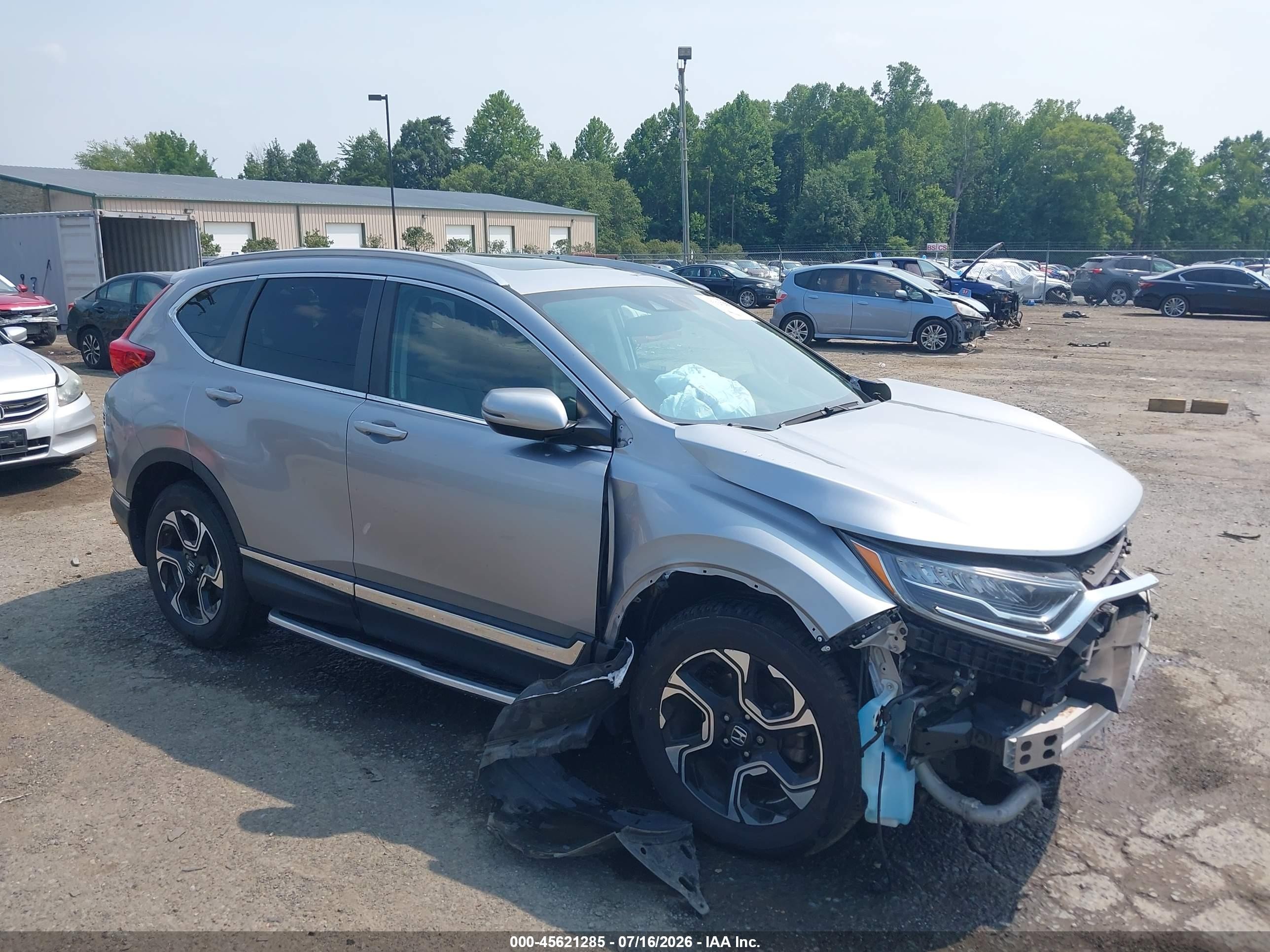 2019 Honda CR-V Touring, VIN 7FARW2H93KE011295 — Front end