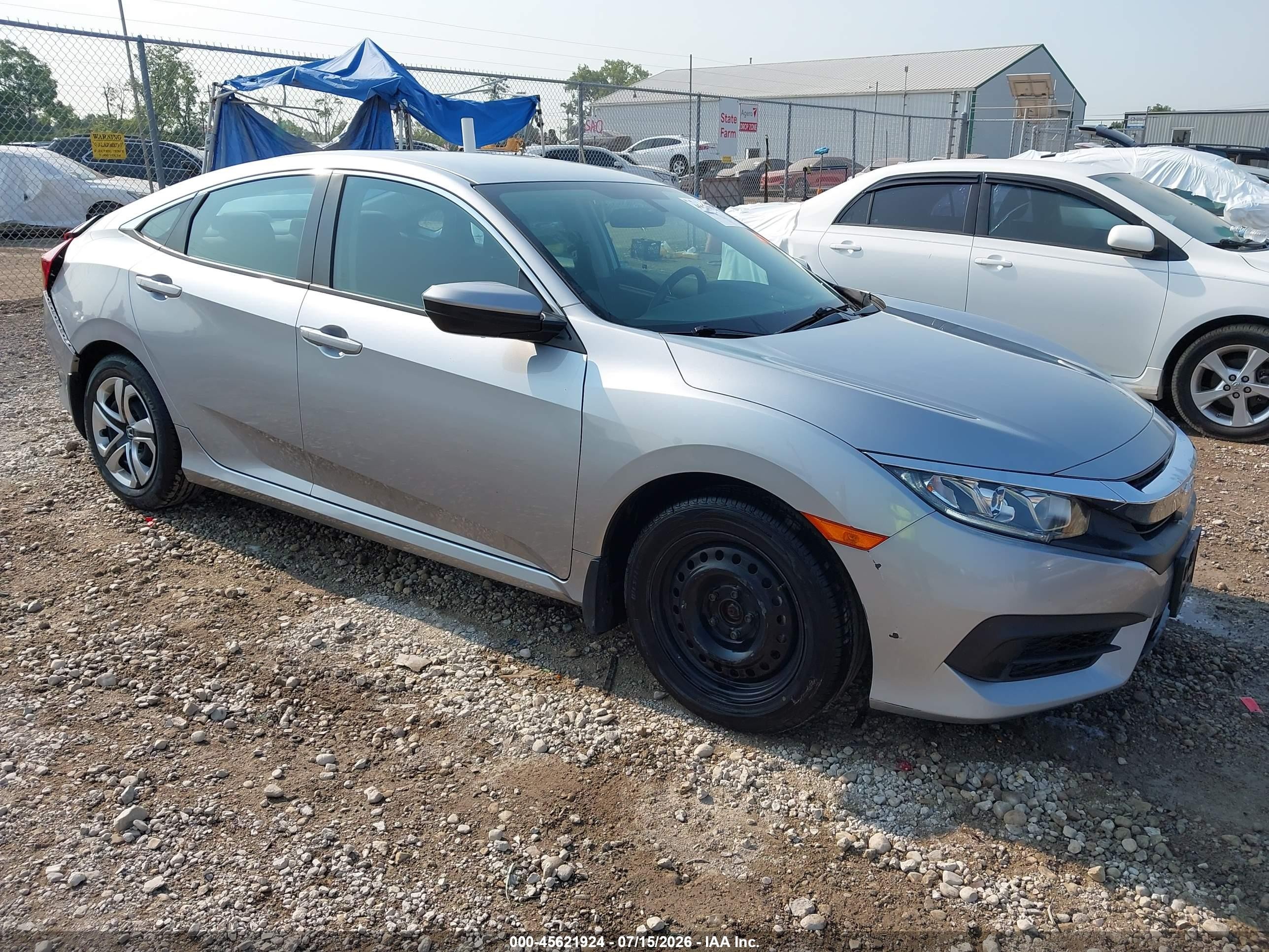 2017 Honda Civic LX, VIN 19XFC2F55HE003737 — Зад