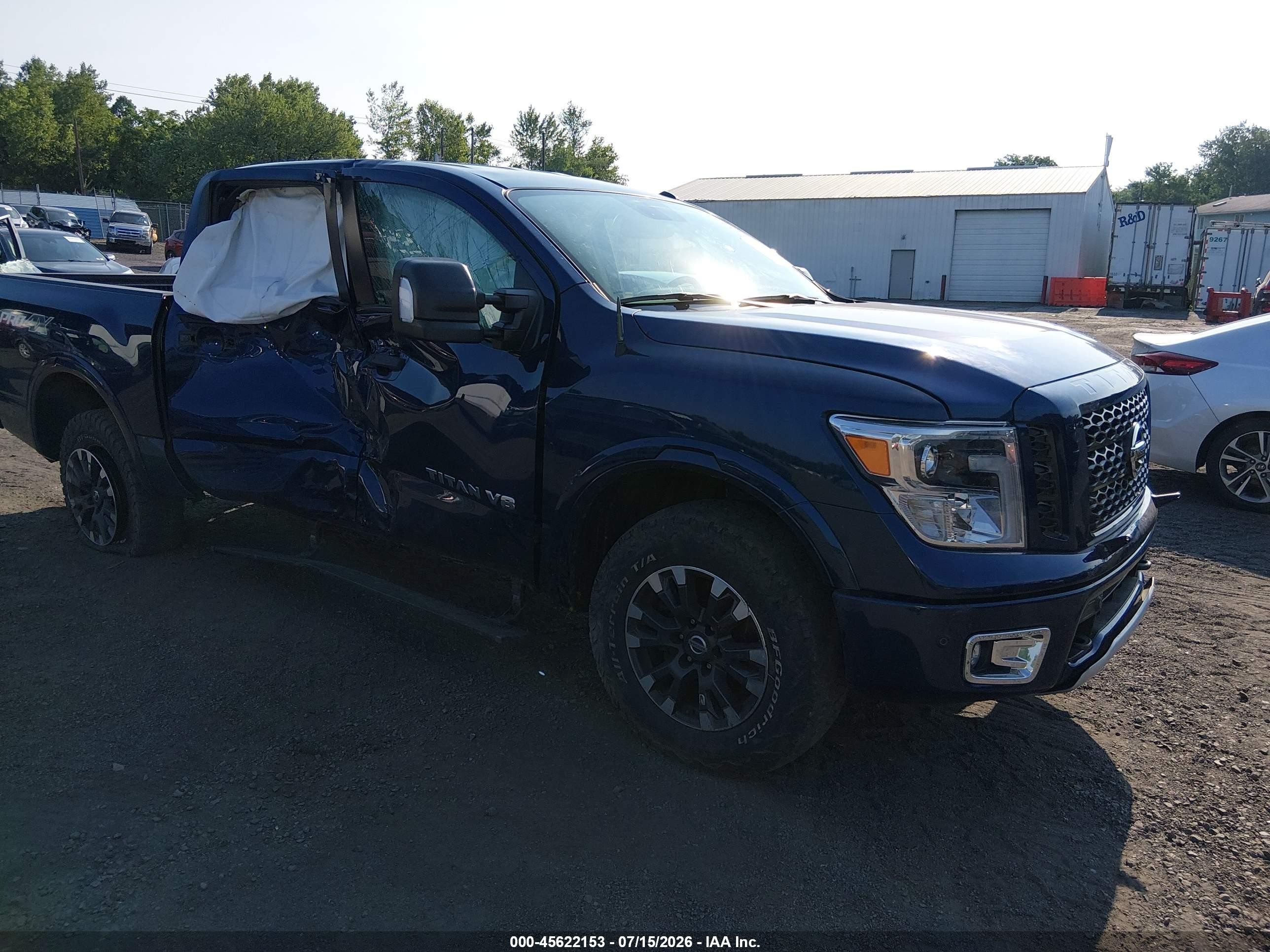 2018 Nissan Titan Pro-4X, VIN 1N6AA1E52JN544108 — Side