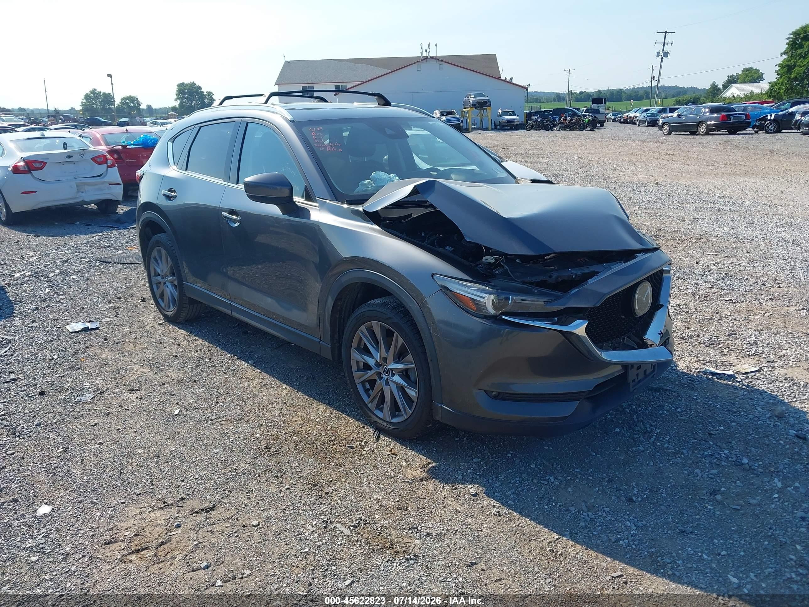 2021 Mazda CX-5 Grand Touring Reserve, VIN JM3KFBAY3M0445327 — Front end