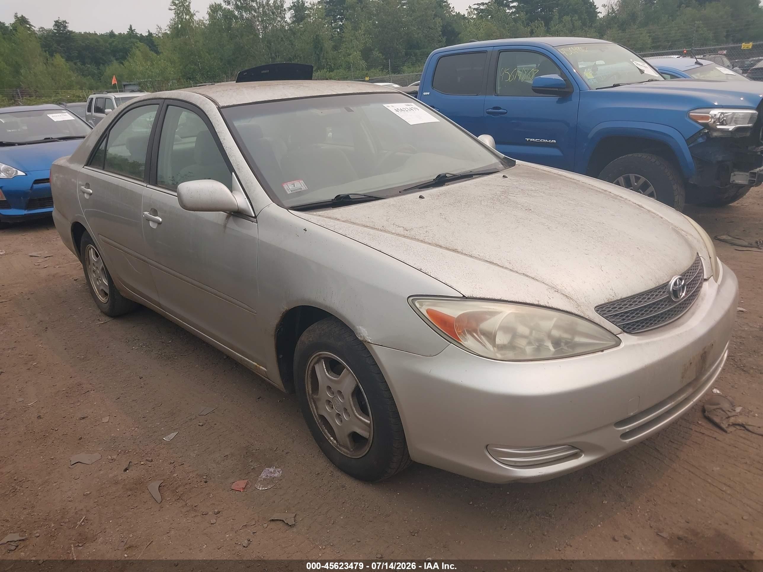2002 Toyota Camry LE, VIN JTDBE32K420041521 — Not stated