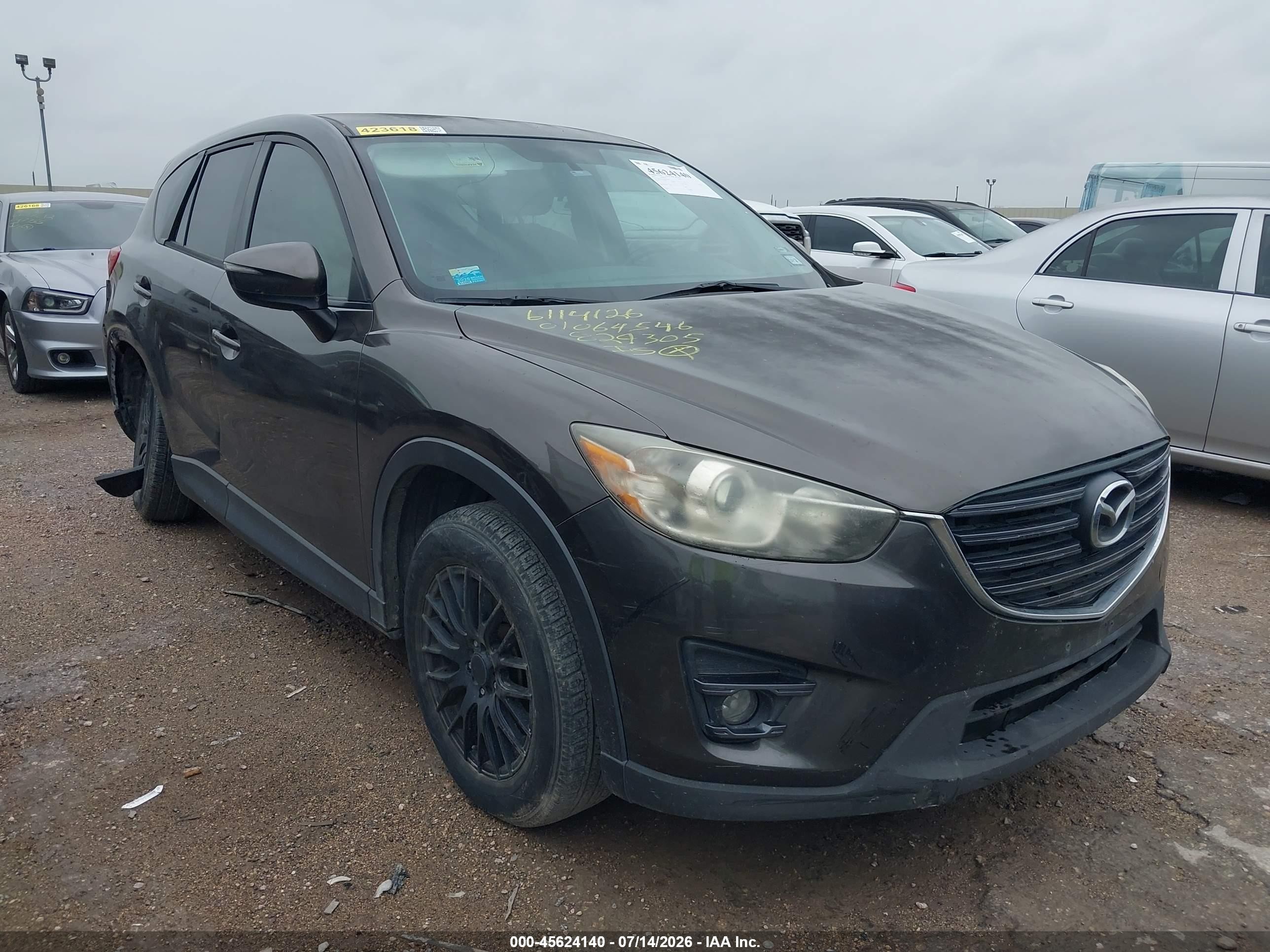 2016 Mazda CX-5 Touring, VIN JM3KE2CY0G0829305 — Normal wear