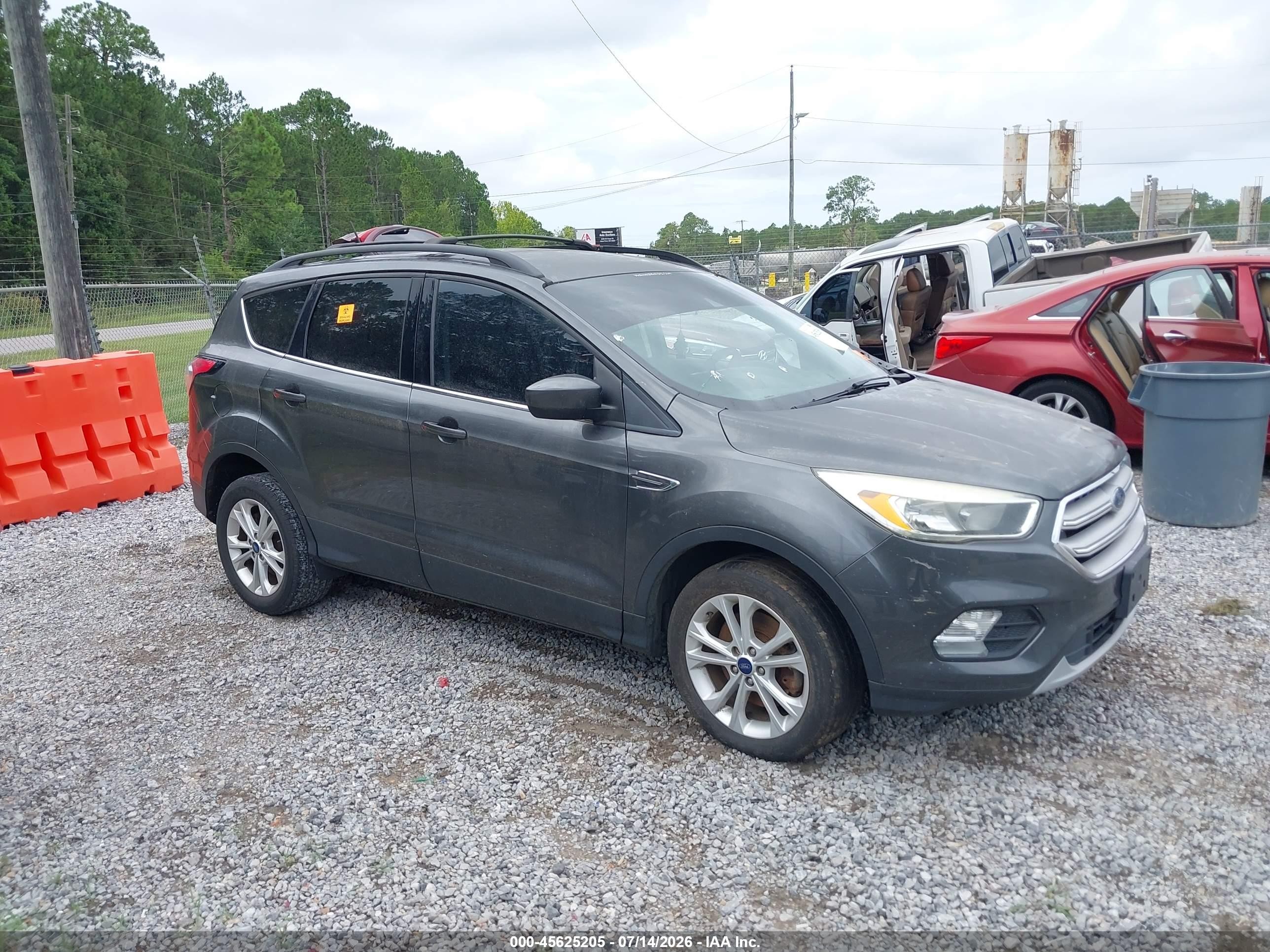 2018 Ford Escape SE, VIN 1FMCU9GD6JUB17019 — Biohazard / chemical