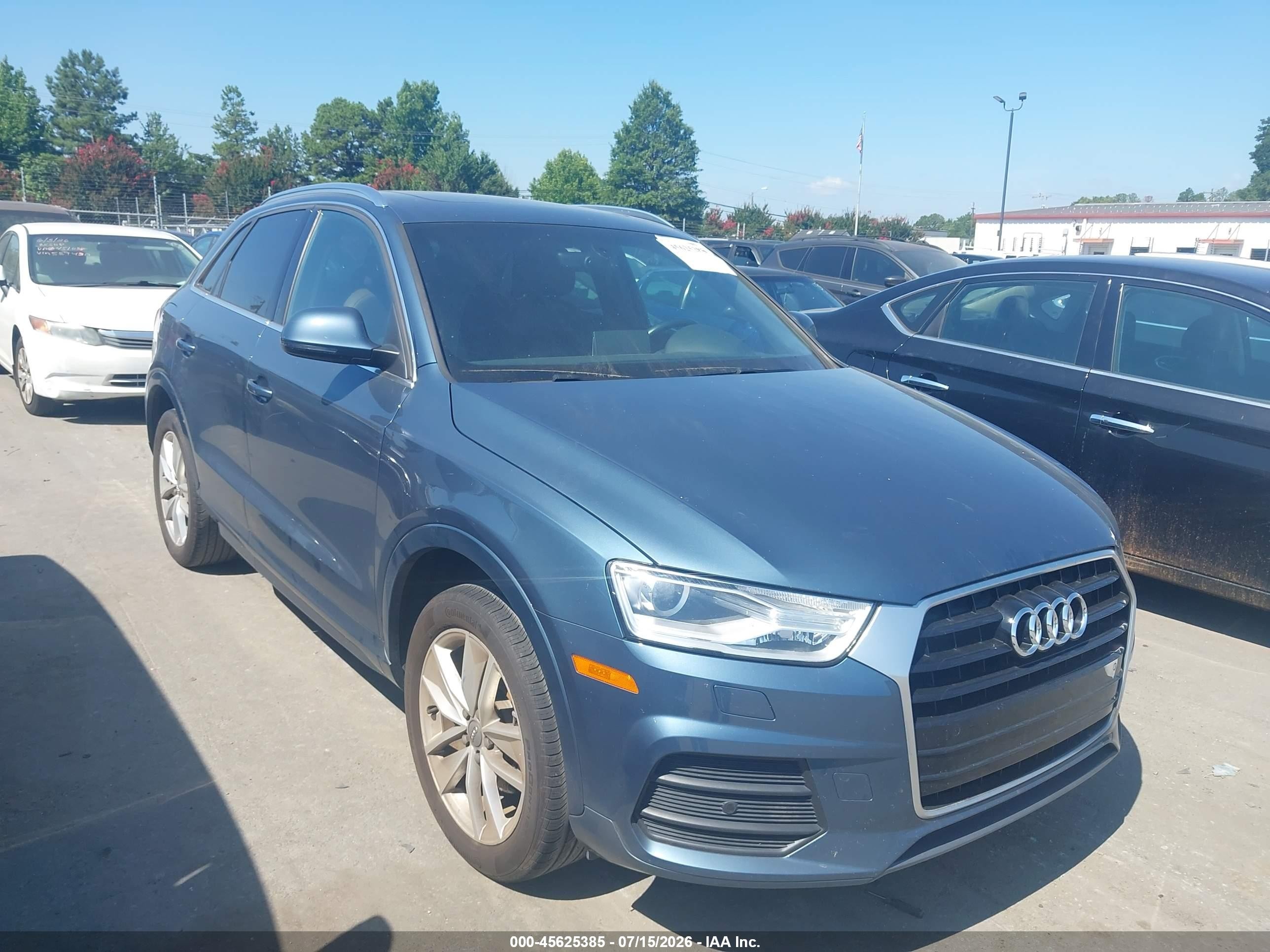 2016 Audi Q3 Premium Plus, VIN WA1BFCFSXGR018734 — Normal wear