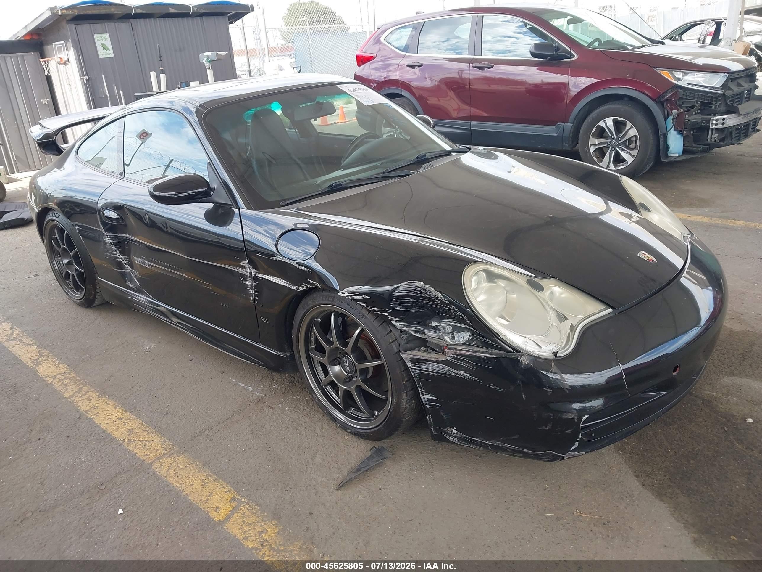 2000 Porsche 911, VIN WP0AA299XYS622975 — Бок