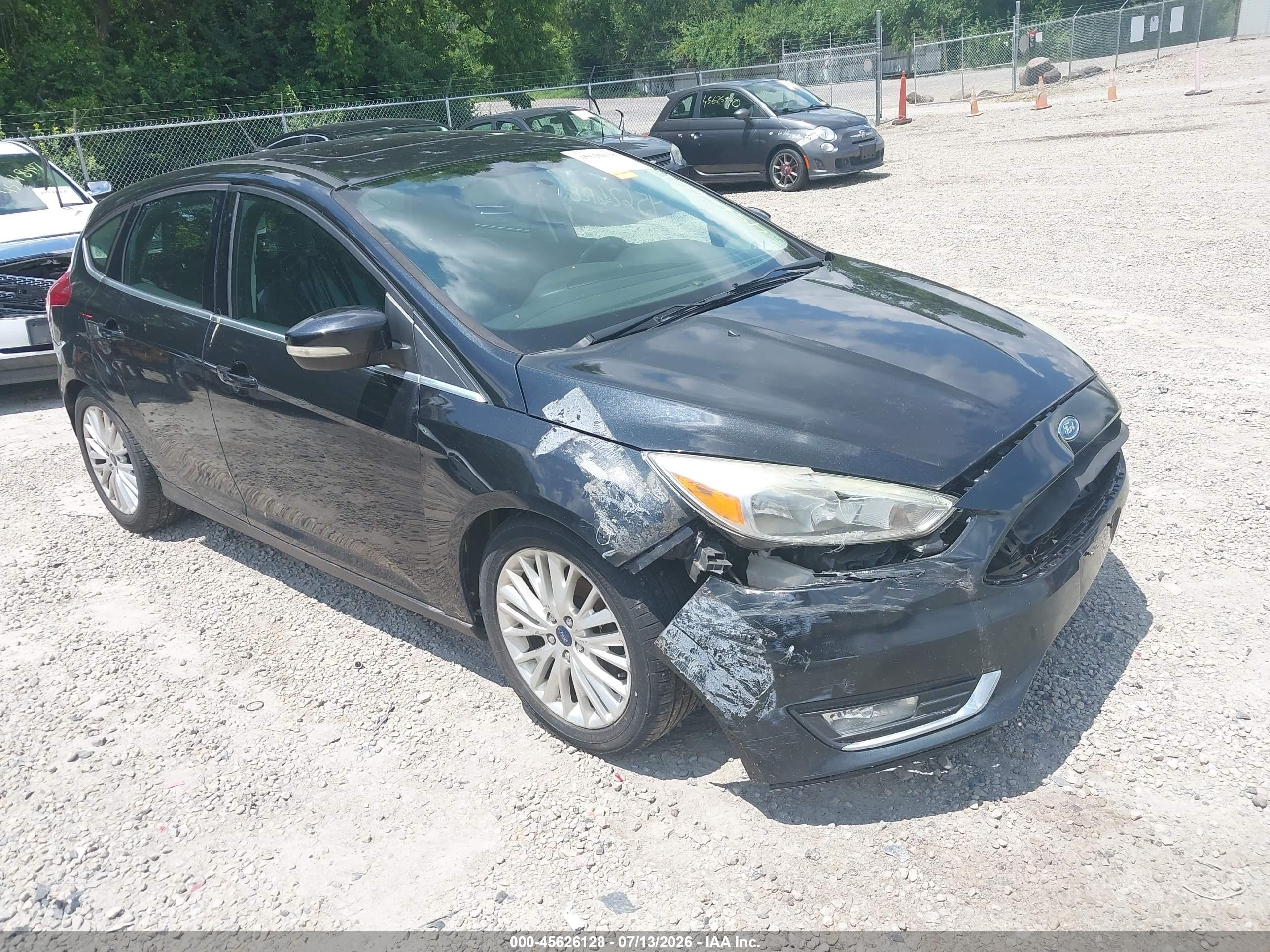 2015 Ford Focus Titanium, VIN 1FADP3N22FL356018 — Normal wear