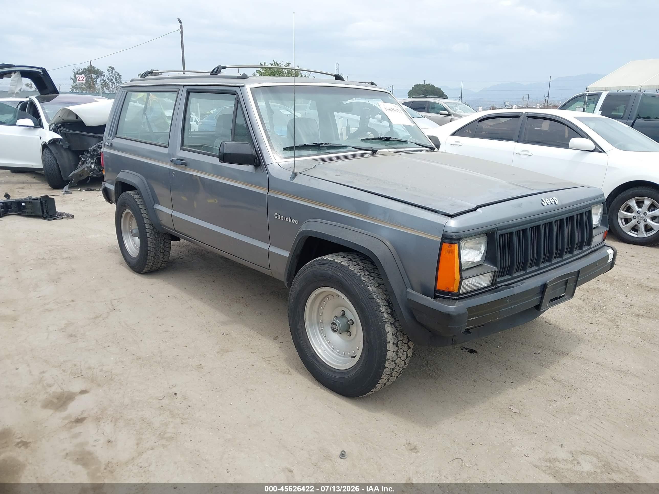 1991 Jeep Cherokee, VIN 1J4FJ27P8ML556884 — Normal wear
