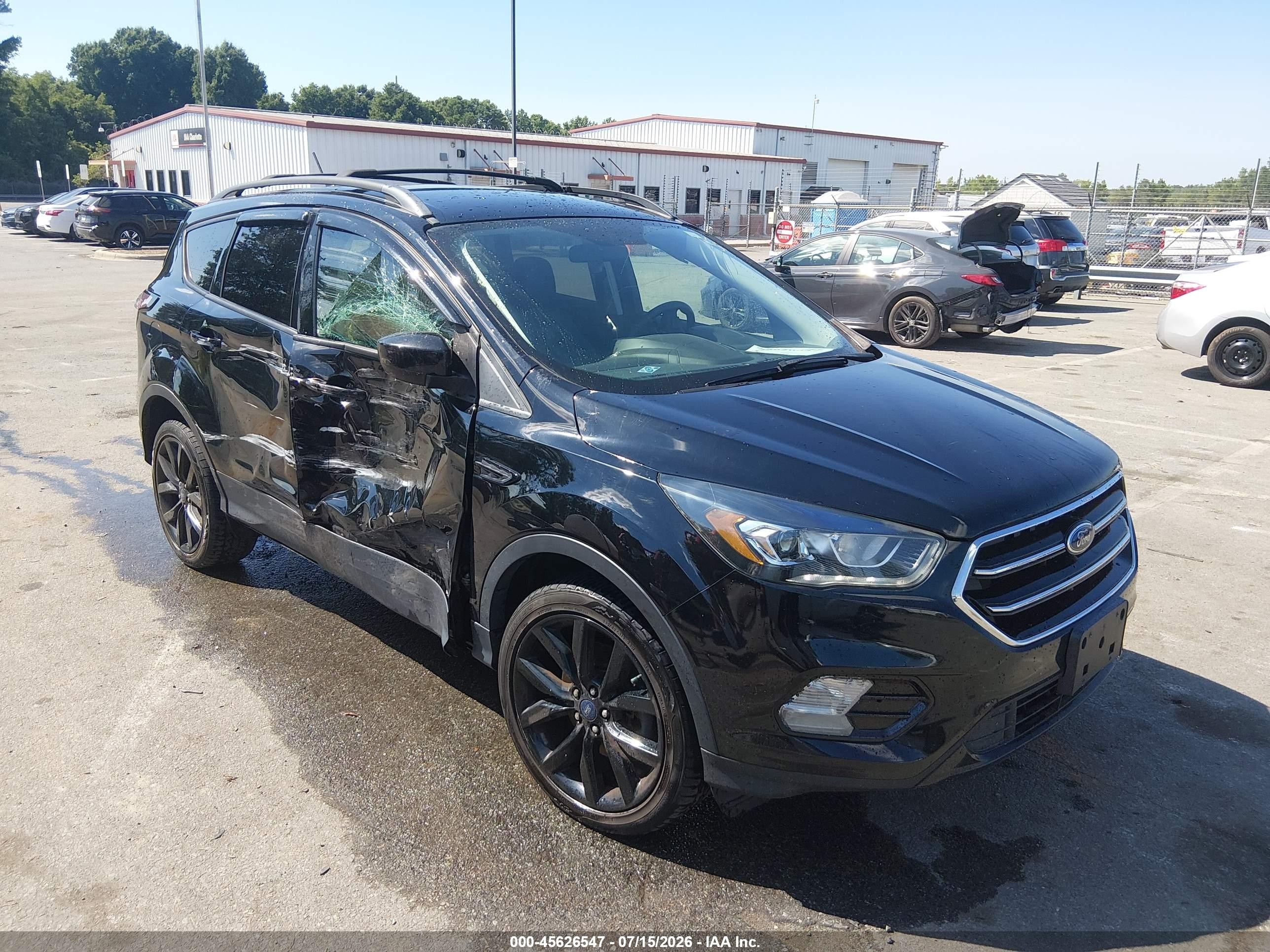 2018 Ford Escape SE, VIN 1FMCU9GDXJUB18741 — Side