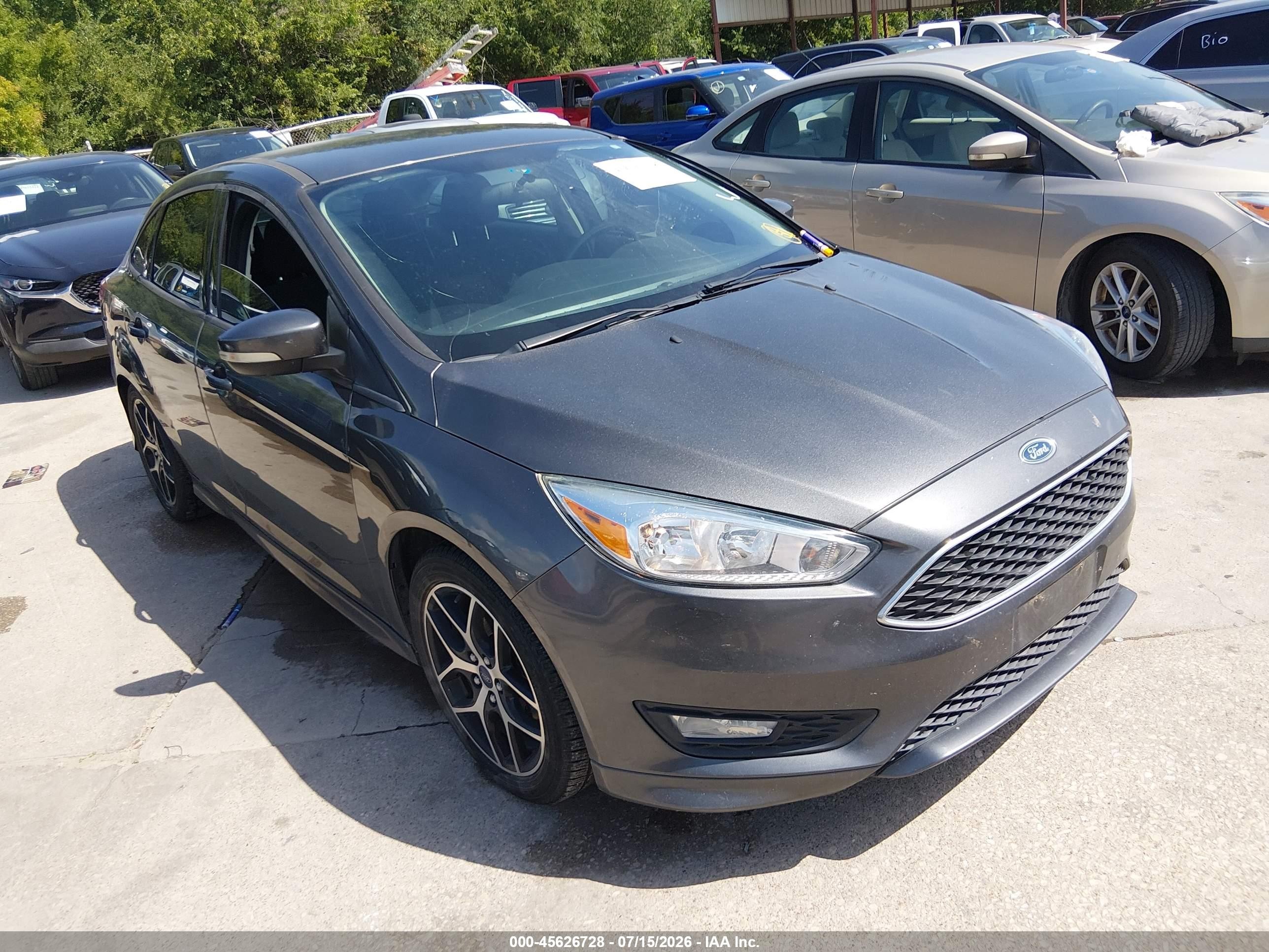 2016 Ford Focus SE, VIN 1FADP3F29GL293452 — Normal wear