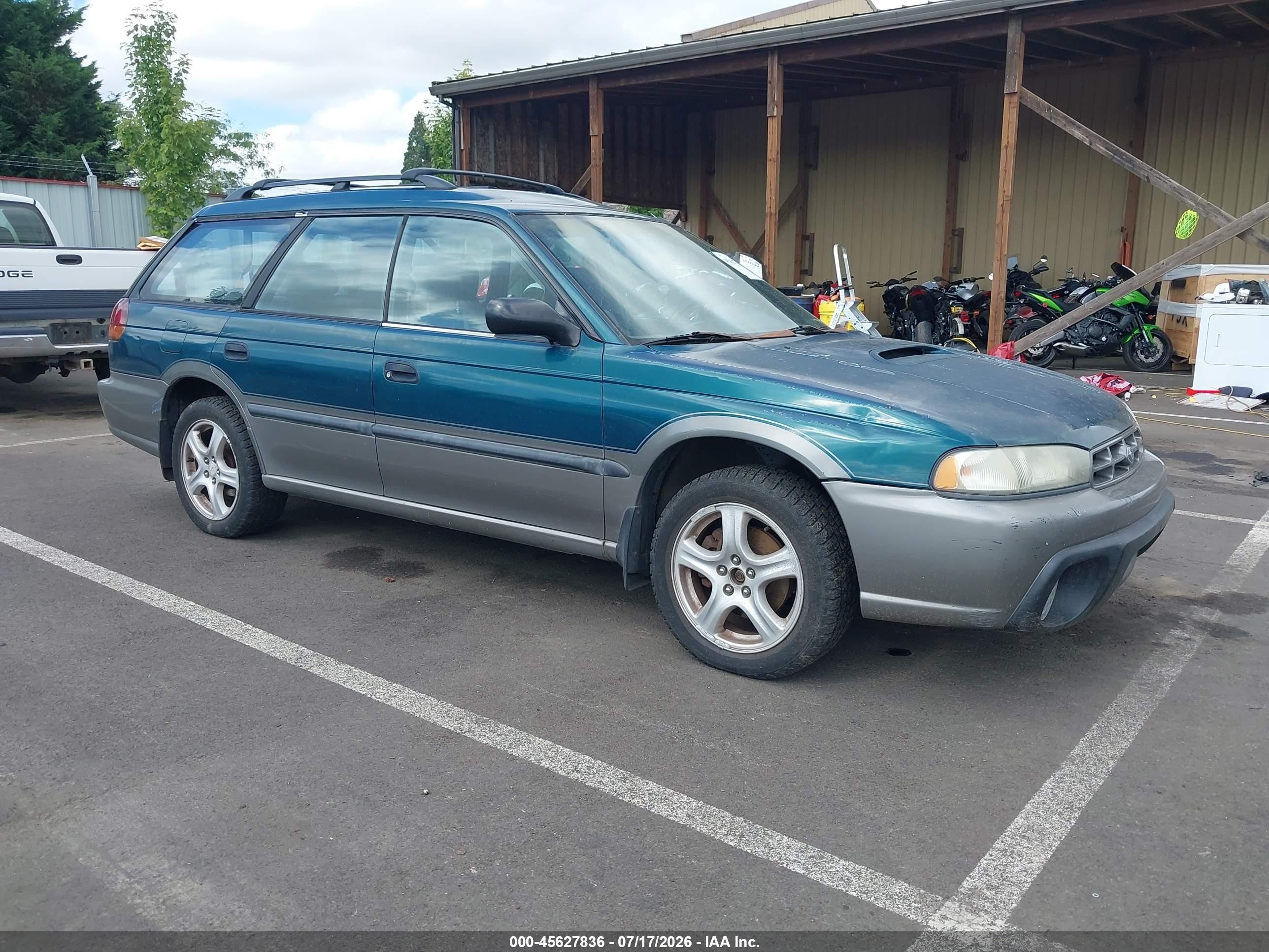 1997 Subaru Legacy Outback, VIN 4S3BG6859V7600151 — Side