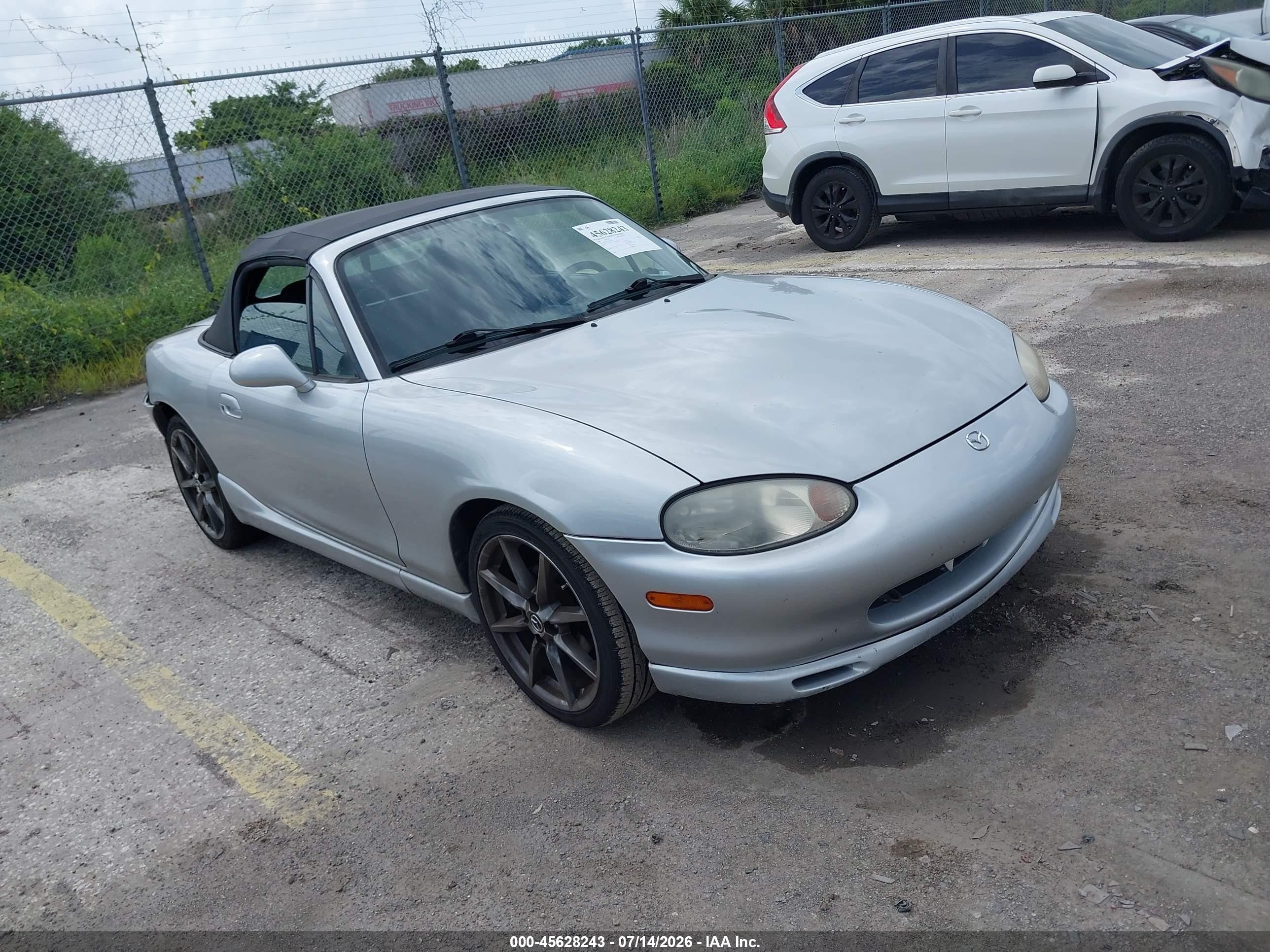 2000 Mazda MX-5 Miata, VIN JM1NB3537Y0142930 — Interior fire