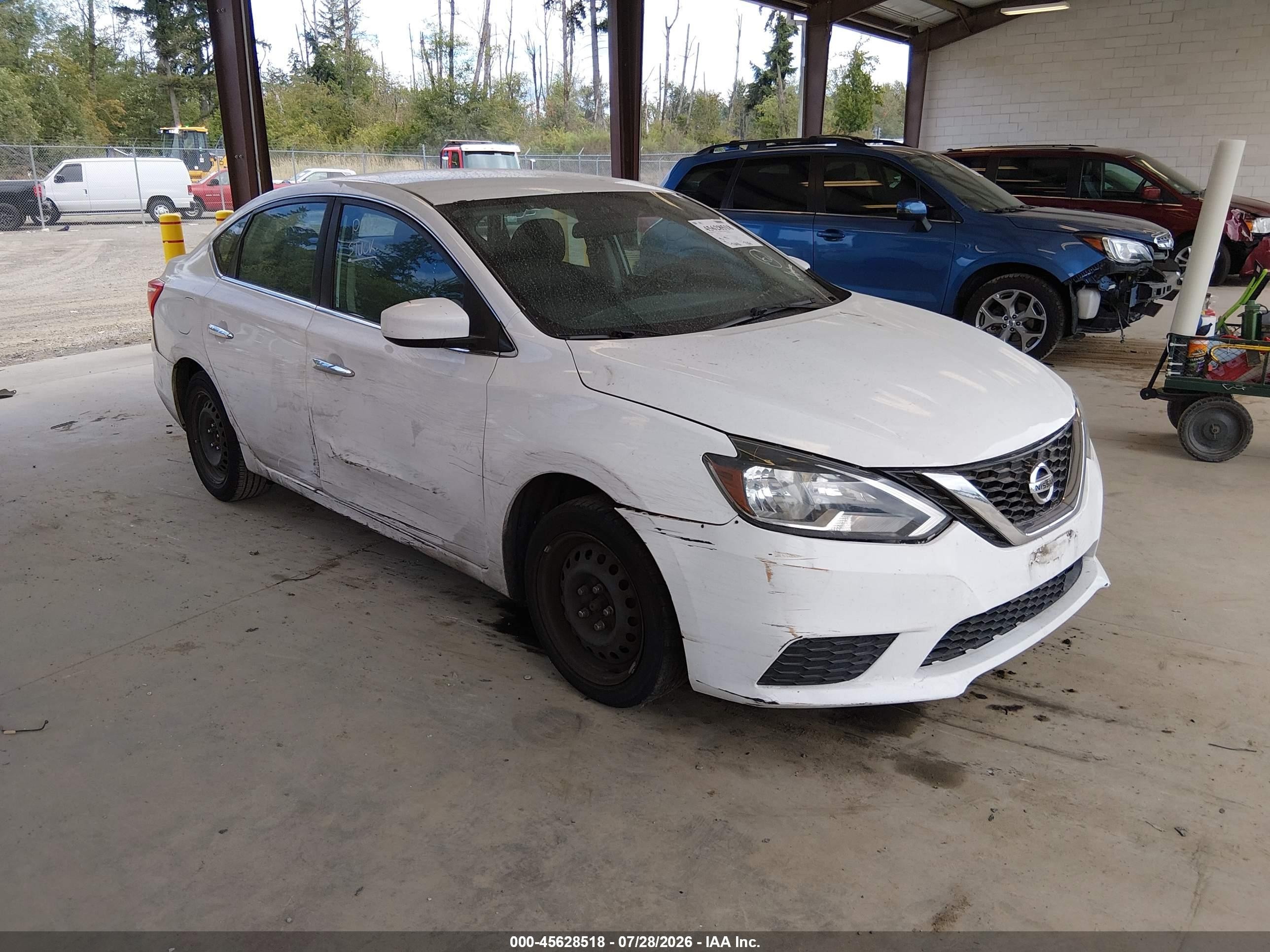 2018 Nissan Sentra S, VIN 3N1AB7AP5JY294699 — Бок