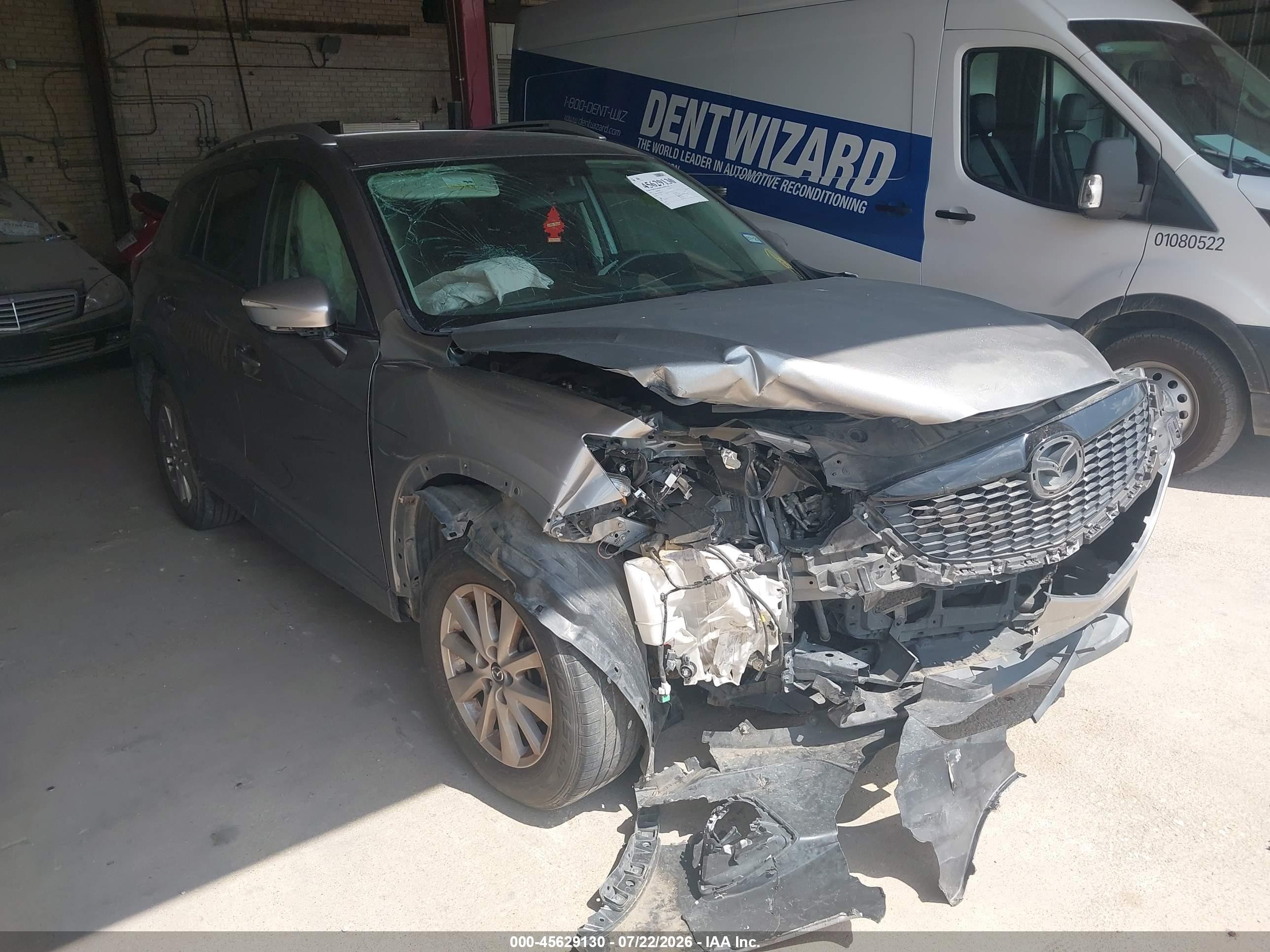 2015 Mazda CX-5 Touring, VIN JM3KE2CY9F0491787 — Обычный износ