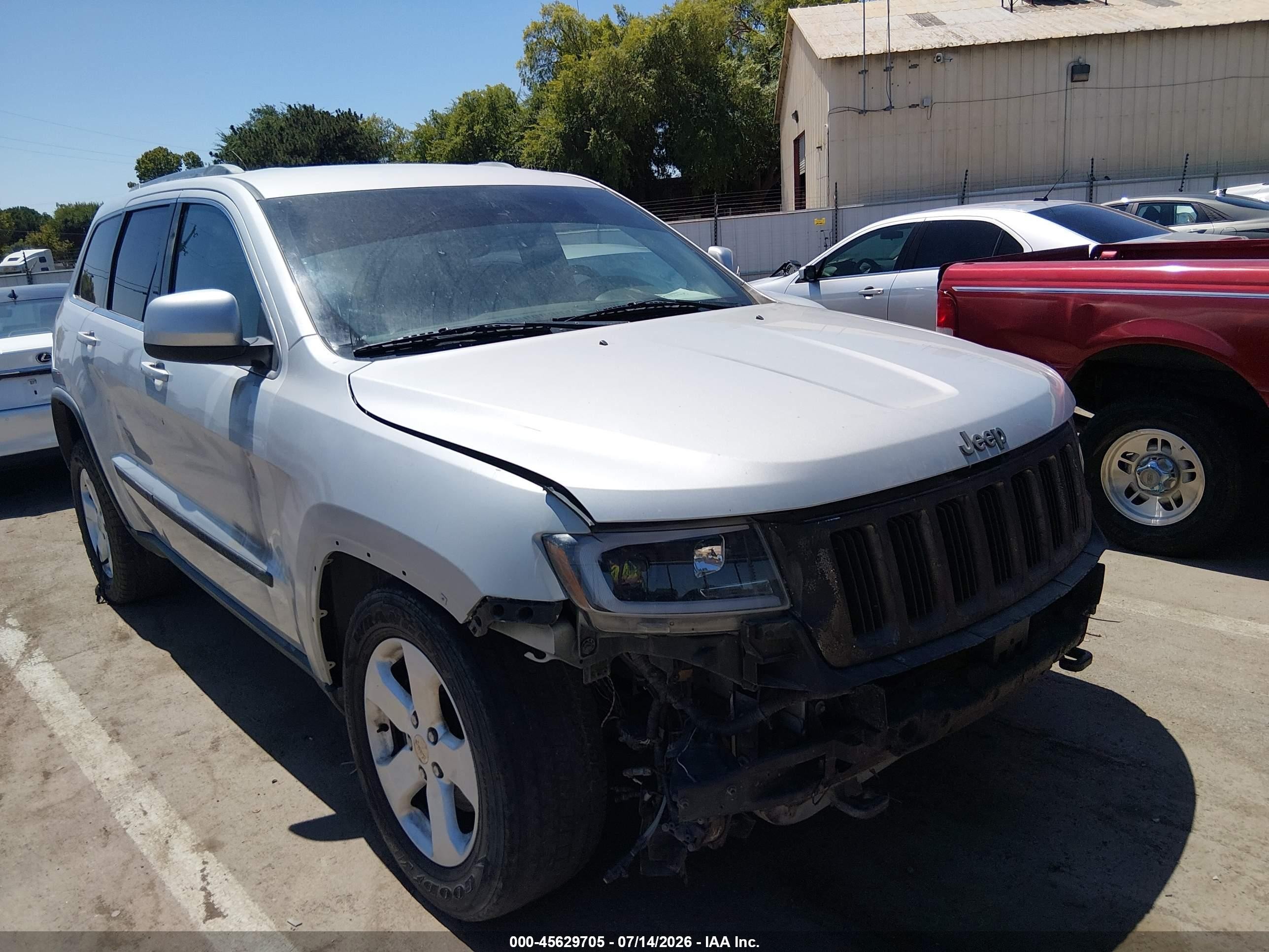 2012 Jeep Grand Cherokee Laredo Altitude, VIN 1C4RJFAT1CC195318 — Normal wear