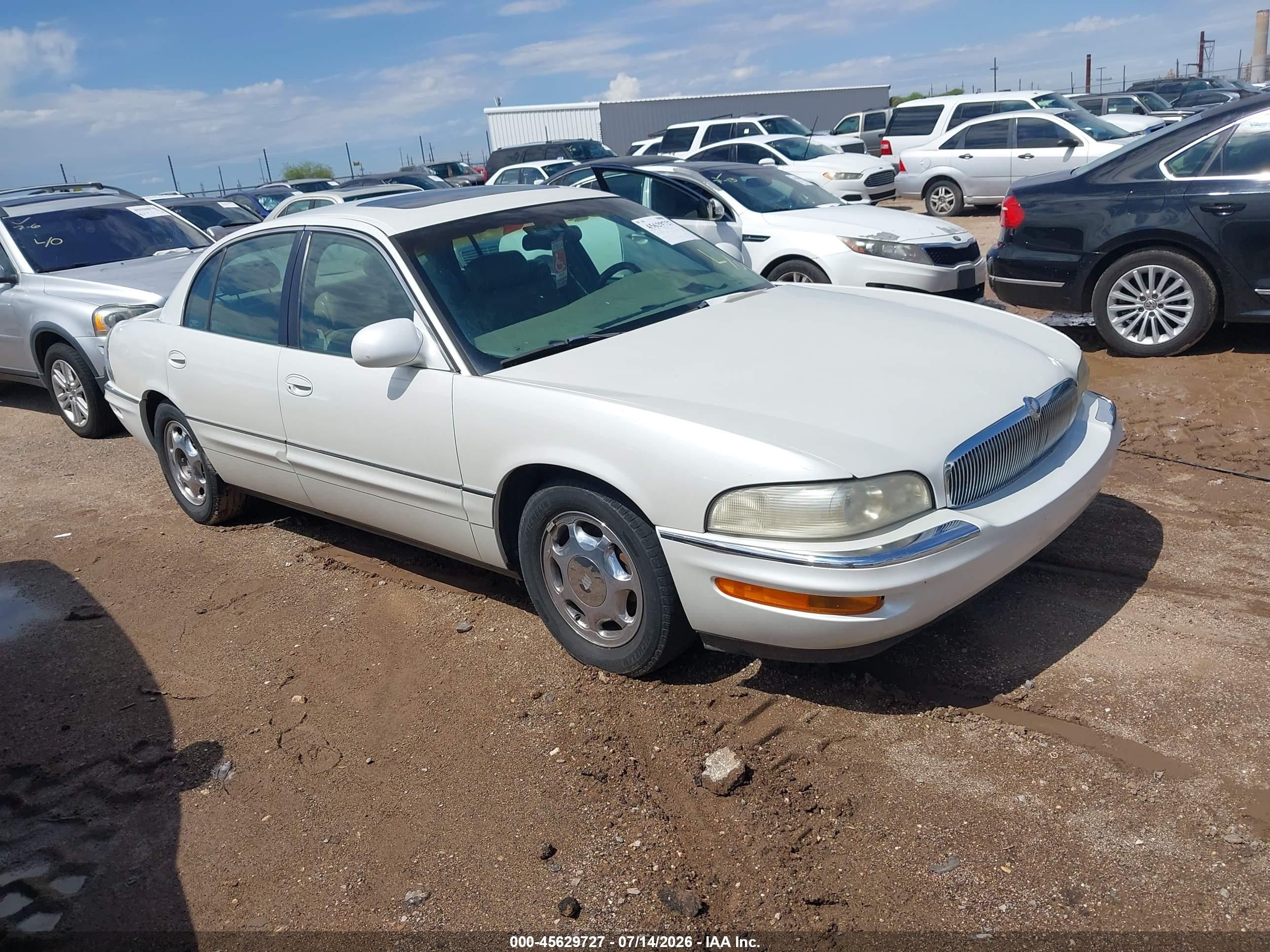 1999 Buick Park Avenue Ultra, VIN 1G4CU5216X4650938 — Normal wear