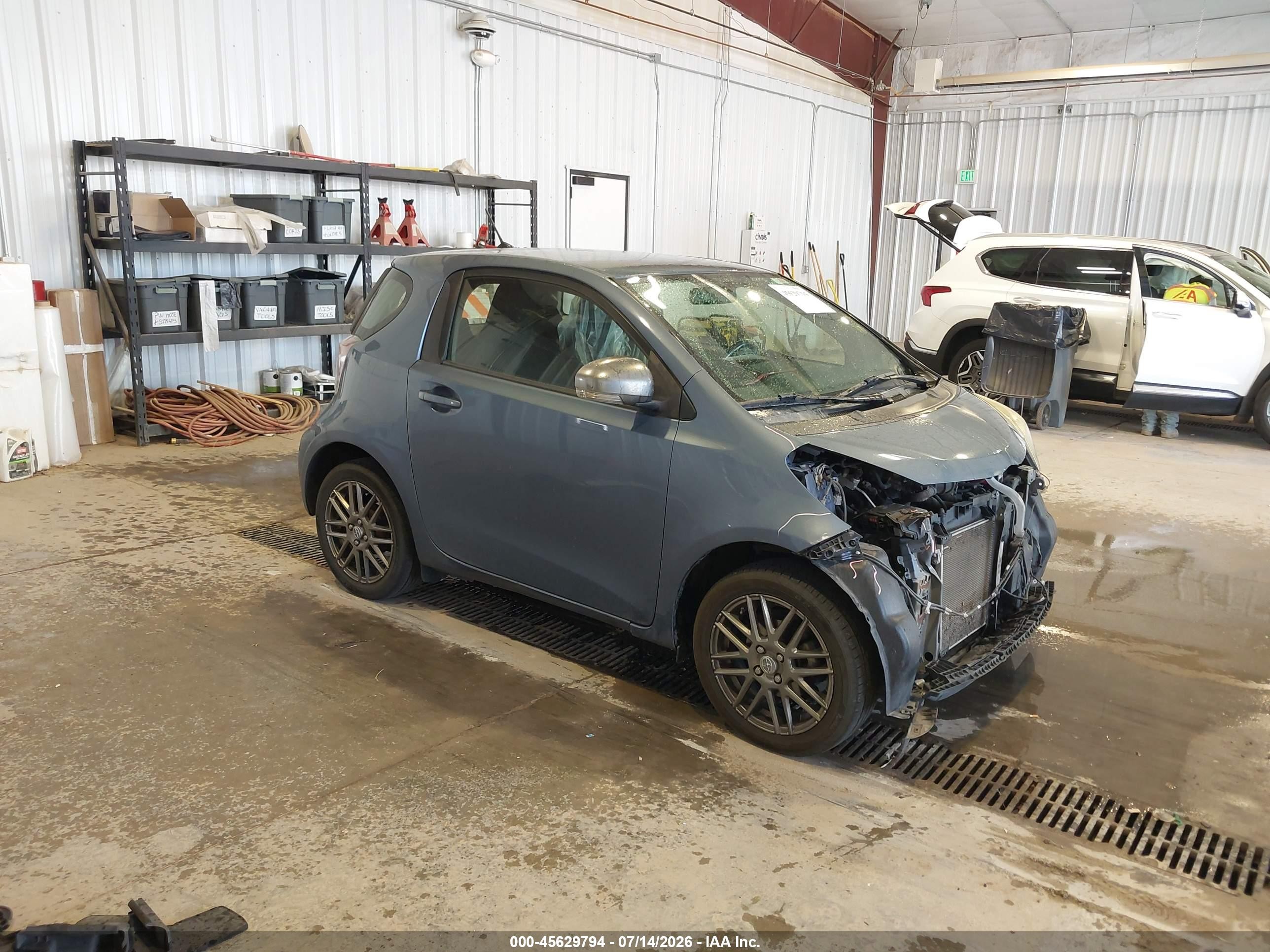 2012 Scion iQ, VIN JTNJJXB01CJ021456 — Front end