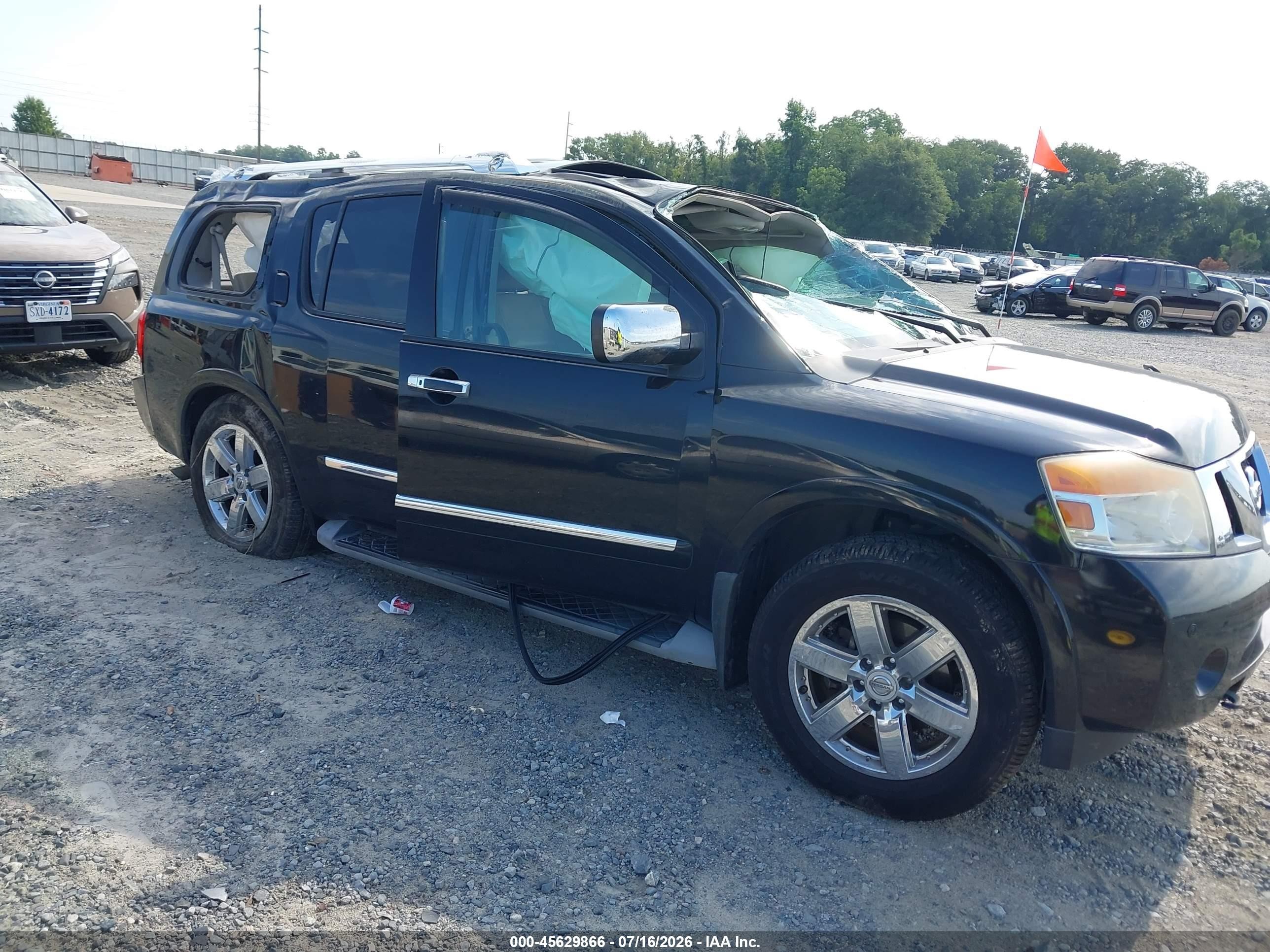 2014 Nissan Armada Platinum, VIN 5N1BA0NF1EN610126 — Rollover