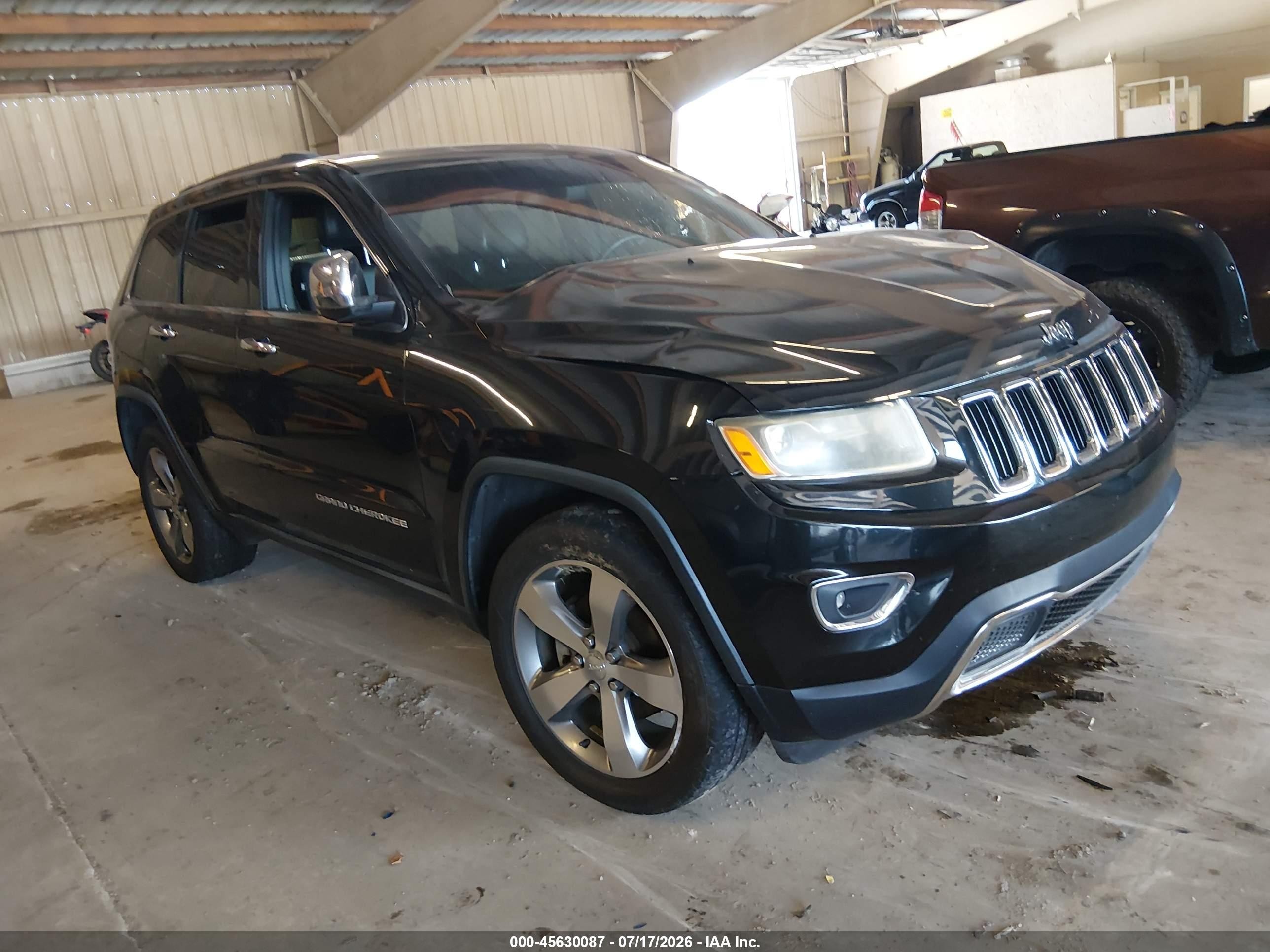 2014 Jeep Grand Cherokee Limited, VIN 1C4RJEBG3EC157569 — Side