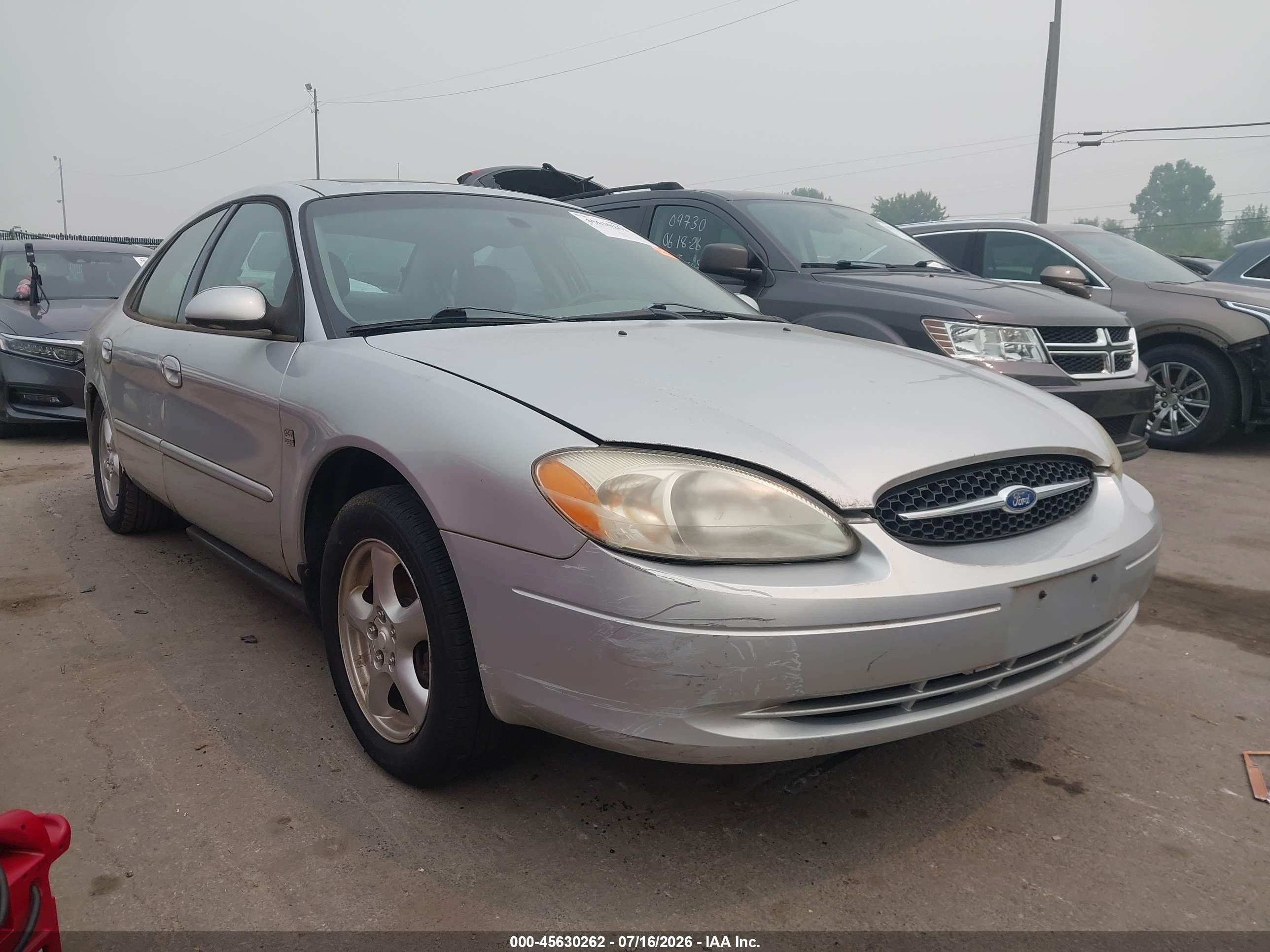 2002 Ford Taurus SES Standard, VIN 1FAFP55S62G131656 — Side