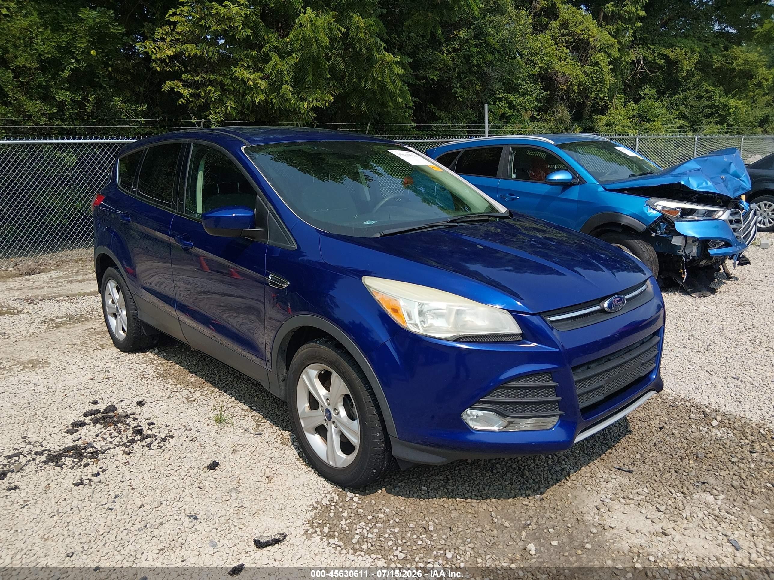 2015 Ford Escape SE, VIN 1FMCU0GXXFUB68696 — Side