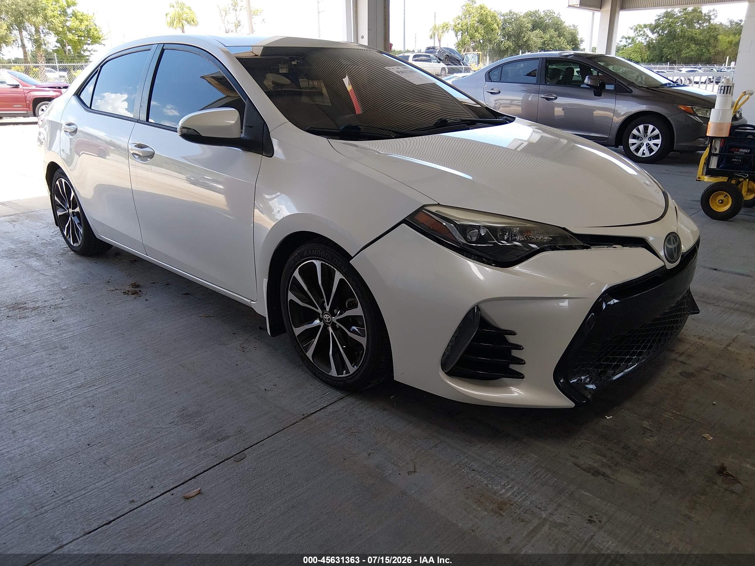 2018 Toyota Corolla LE, VIN 5YFBURHE7JP838888 — Side