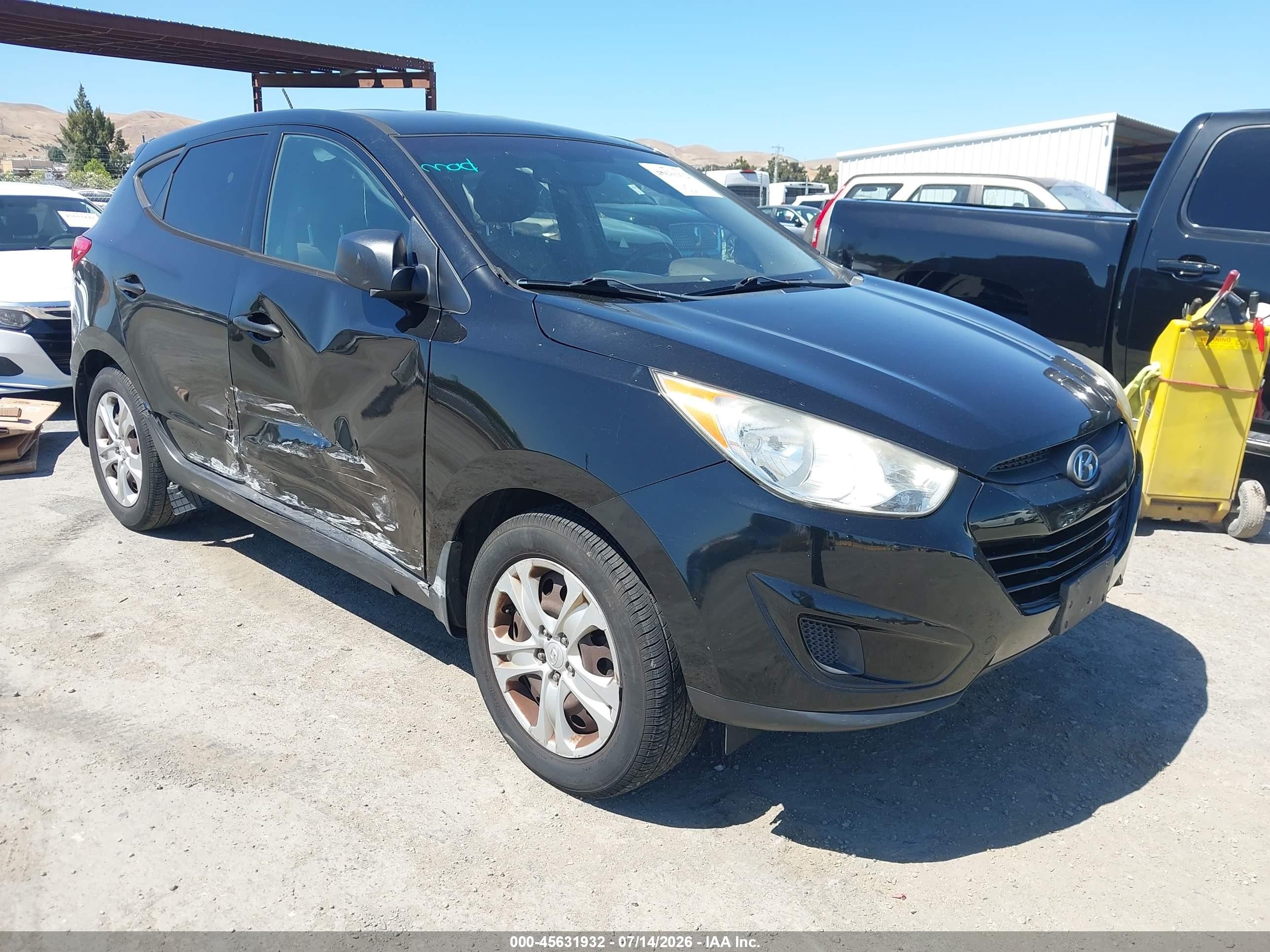 2012 Hyundai Tucson GL, VIN KM8JT3AB9CU511633 — Side