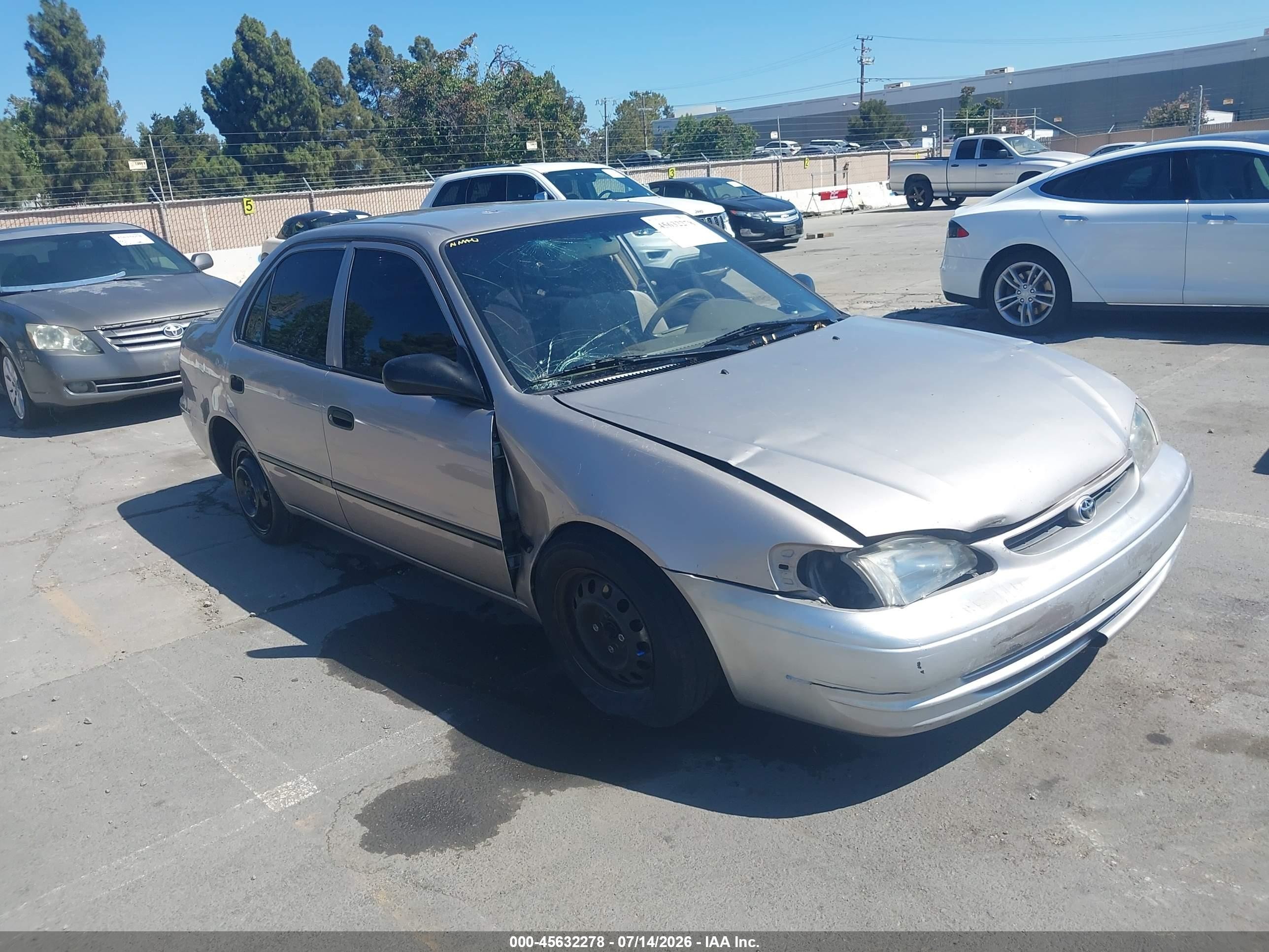 2000 Toyota Corolla CE, VIN 1NXBR12E6YZ304365 — Normal wear