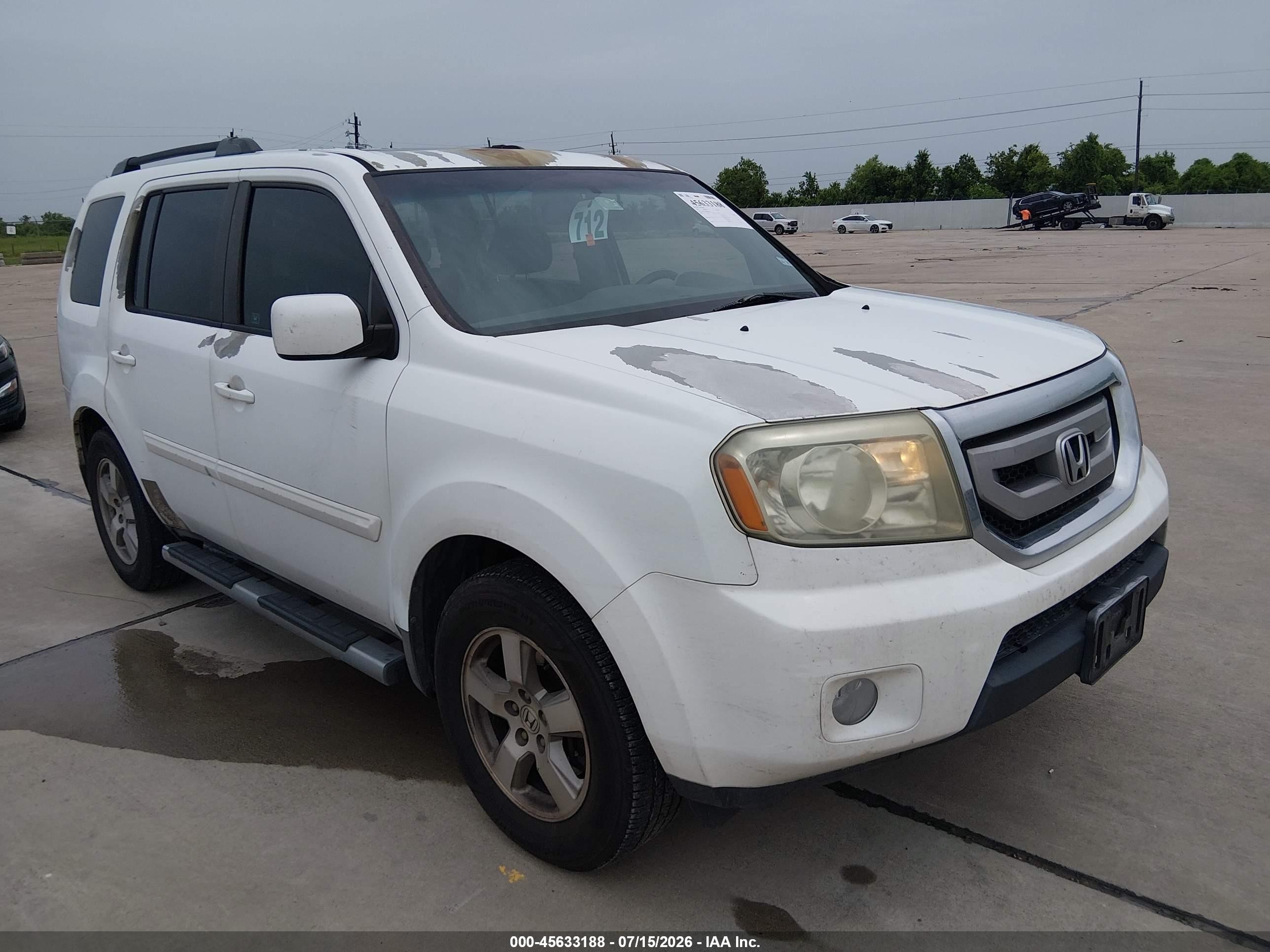 2011 Honda Pilot EX-L, VIN 5FNYF3H69BB046300 — Зад