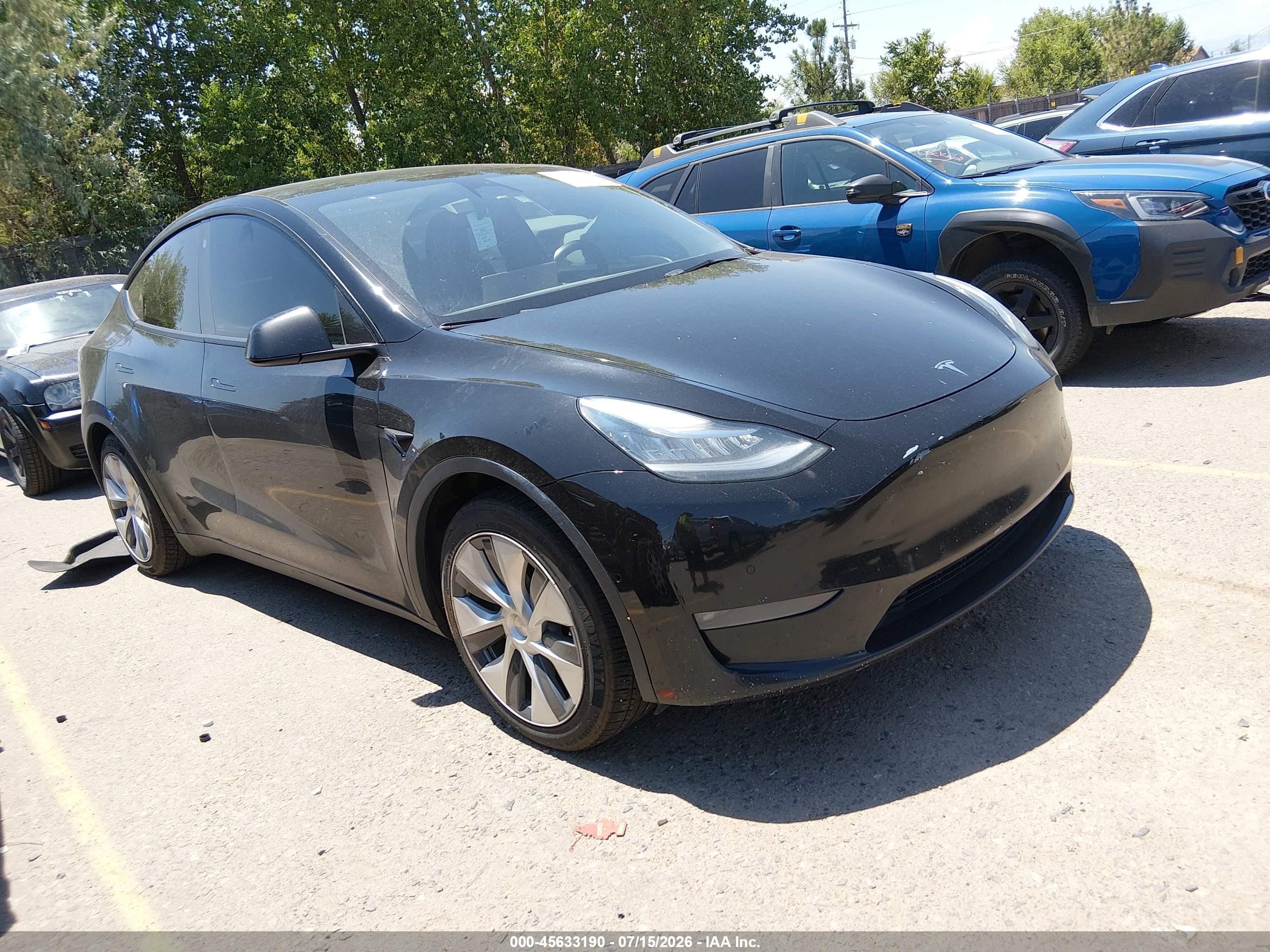 2021 Tesla Model Y Long Range, VIN 5YJYGDEE4MF209162 — Normal wear
