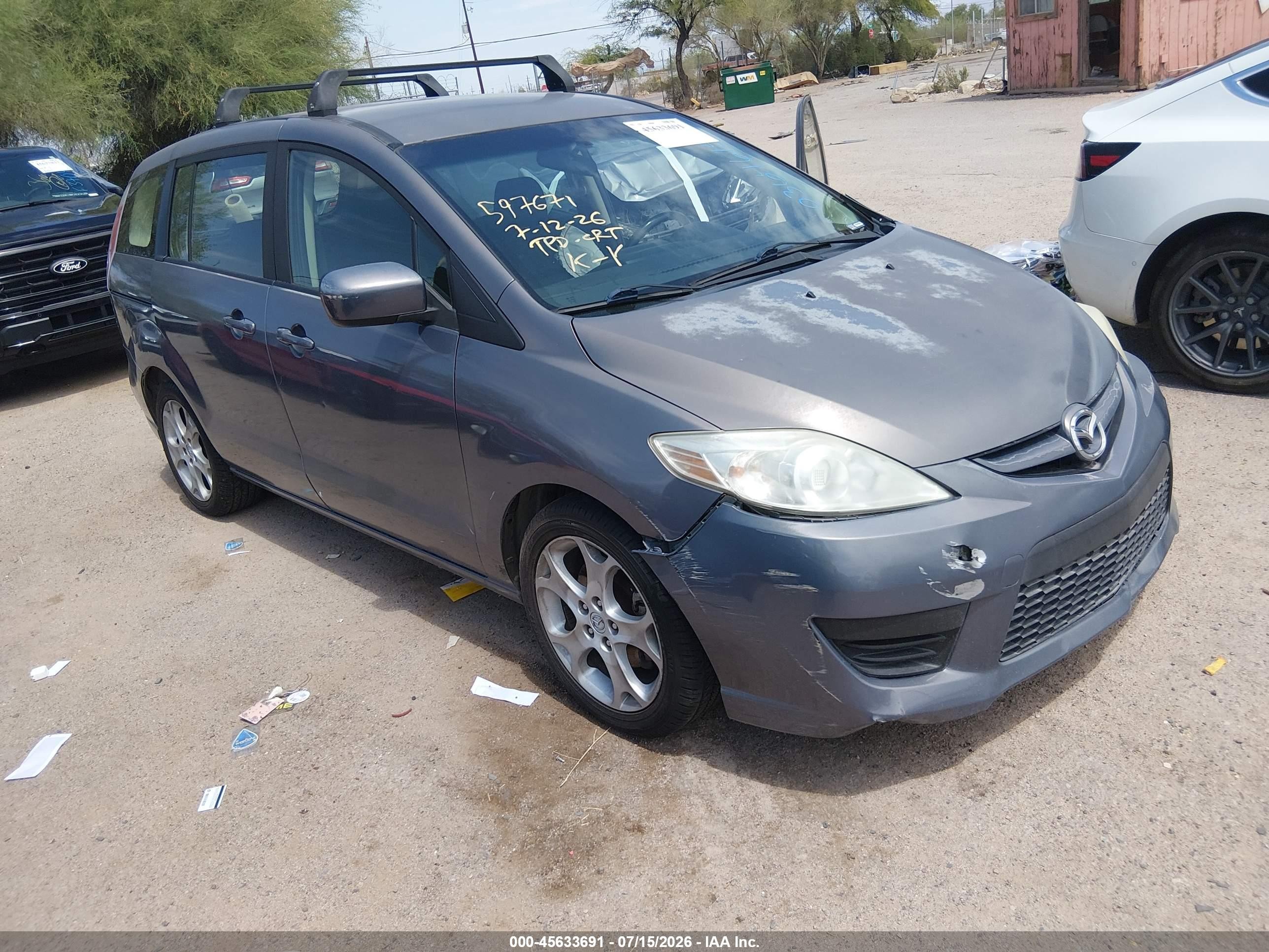 2010 Mazda 5 Sport, VIN JM1CR2W30A0364615 — Side