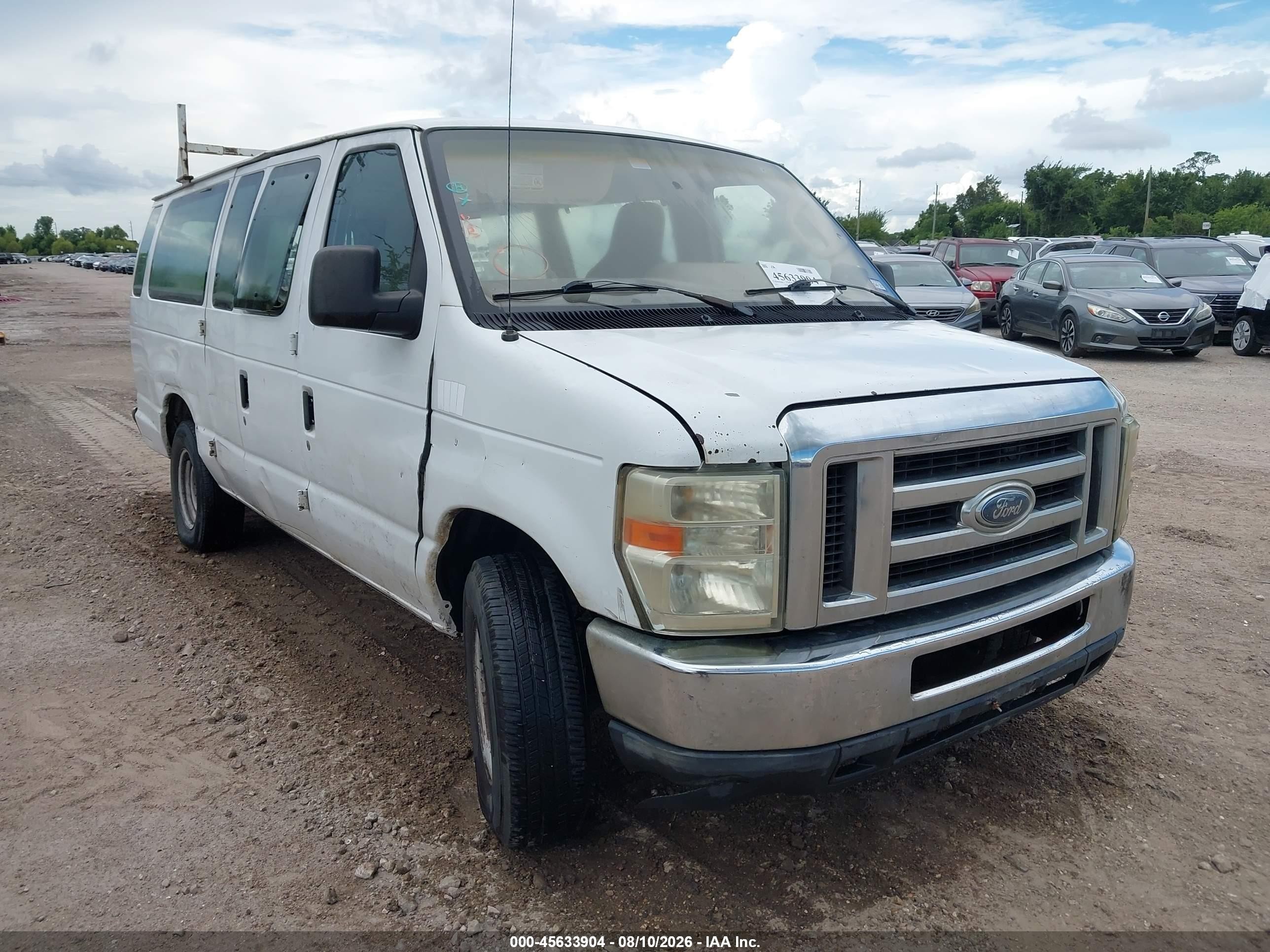 2011 Ford Econoline Passenger XLT, VIN 1FBSS3BL1BDA74975 — Normal wear