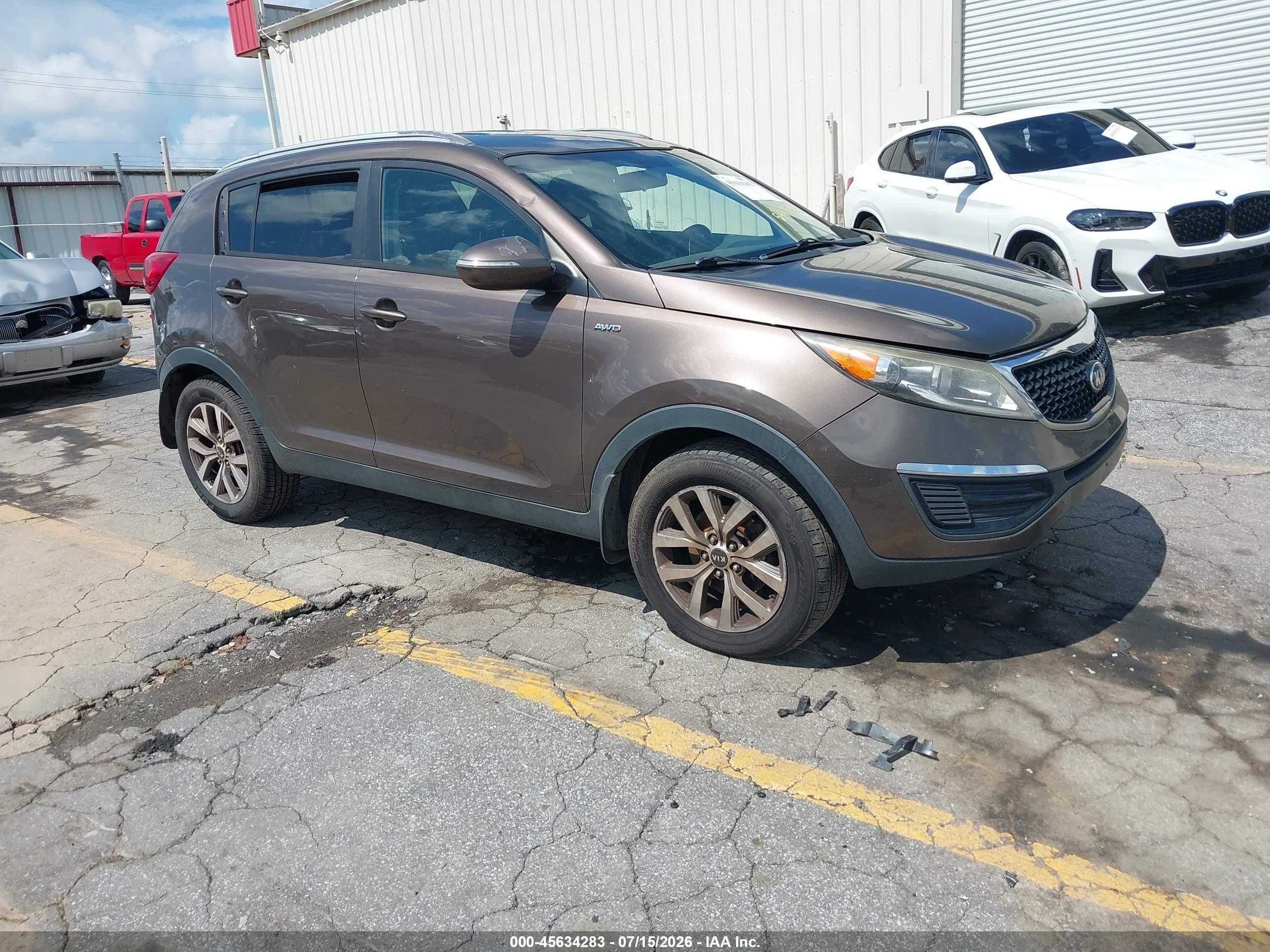 2014 Kia Sportage LX, VIN KNDPBCAC3E7547359 — Side