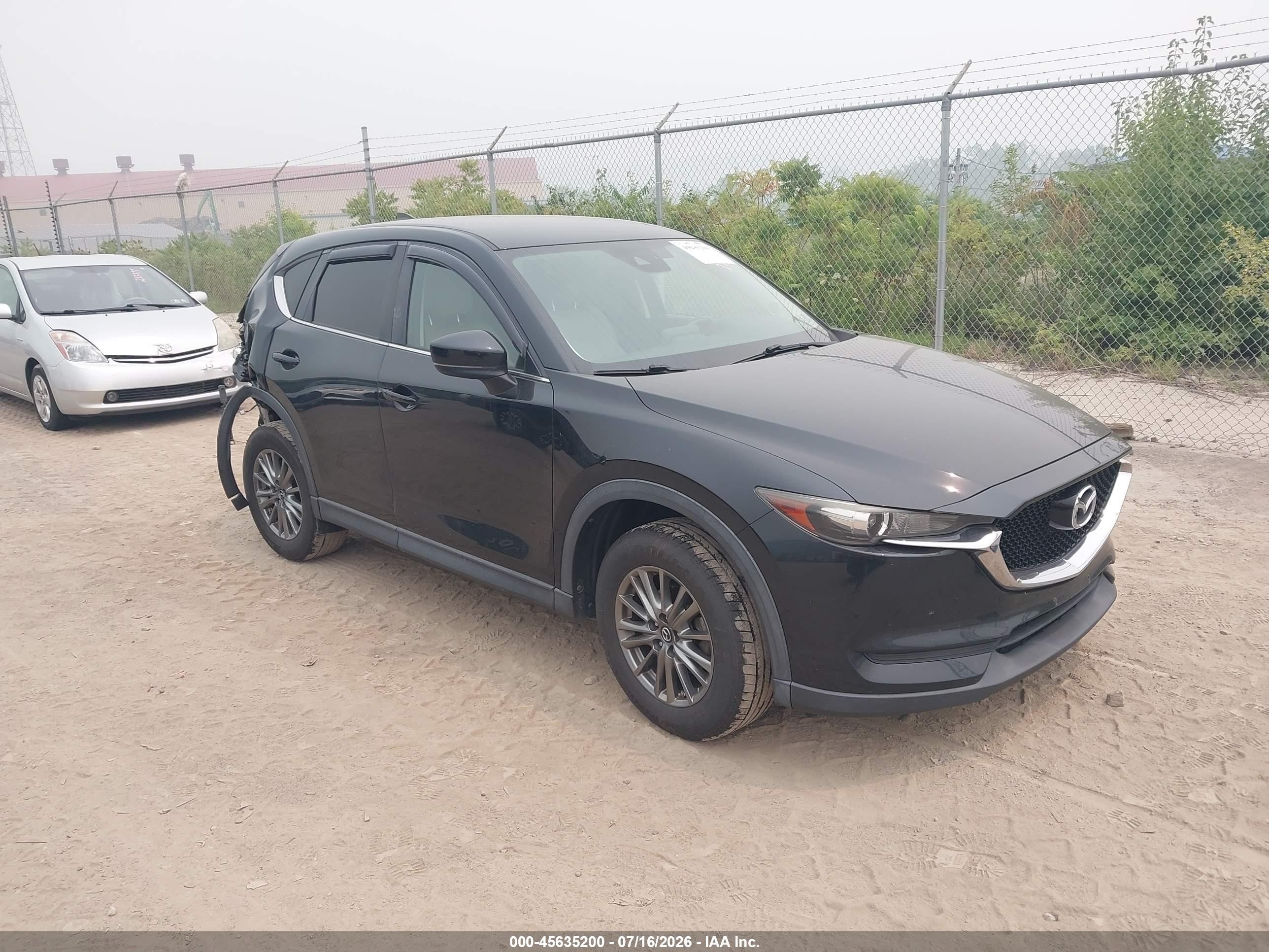 2017 Mazda CX-5 Touring, VIN JM3KFBCL7H0124715 — Зад