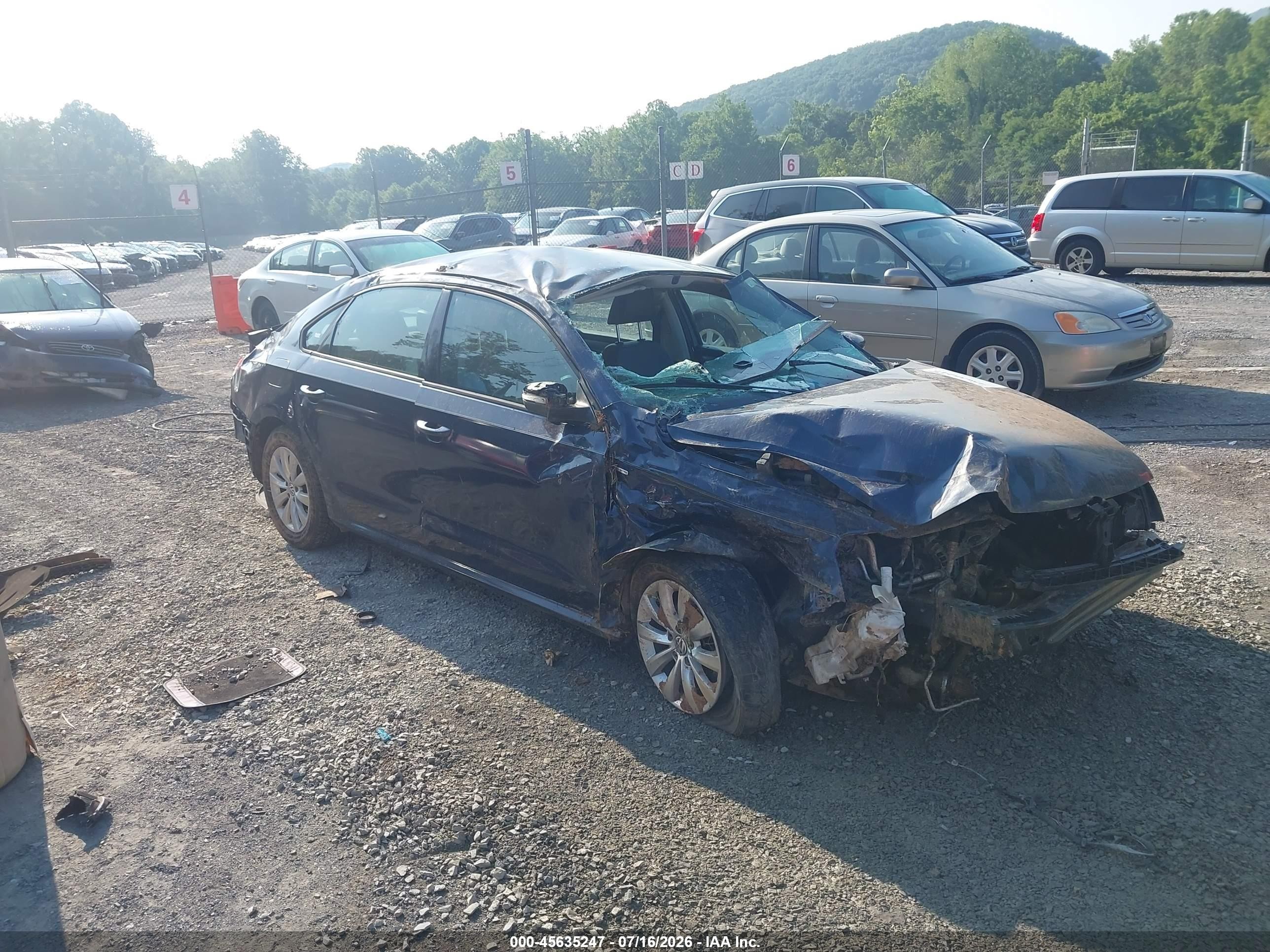2015 Volkswagen Passat S, VIN 1VWAT7A33FC021927 — Rollover